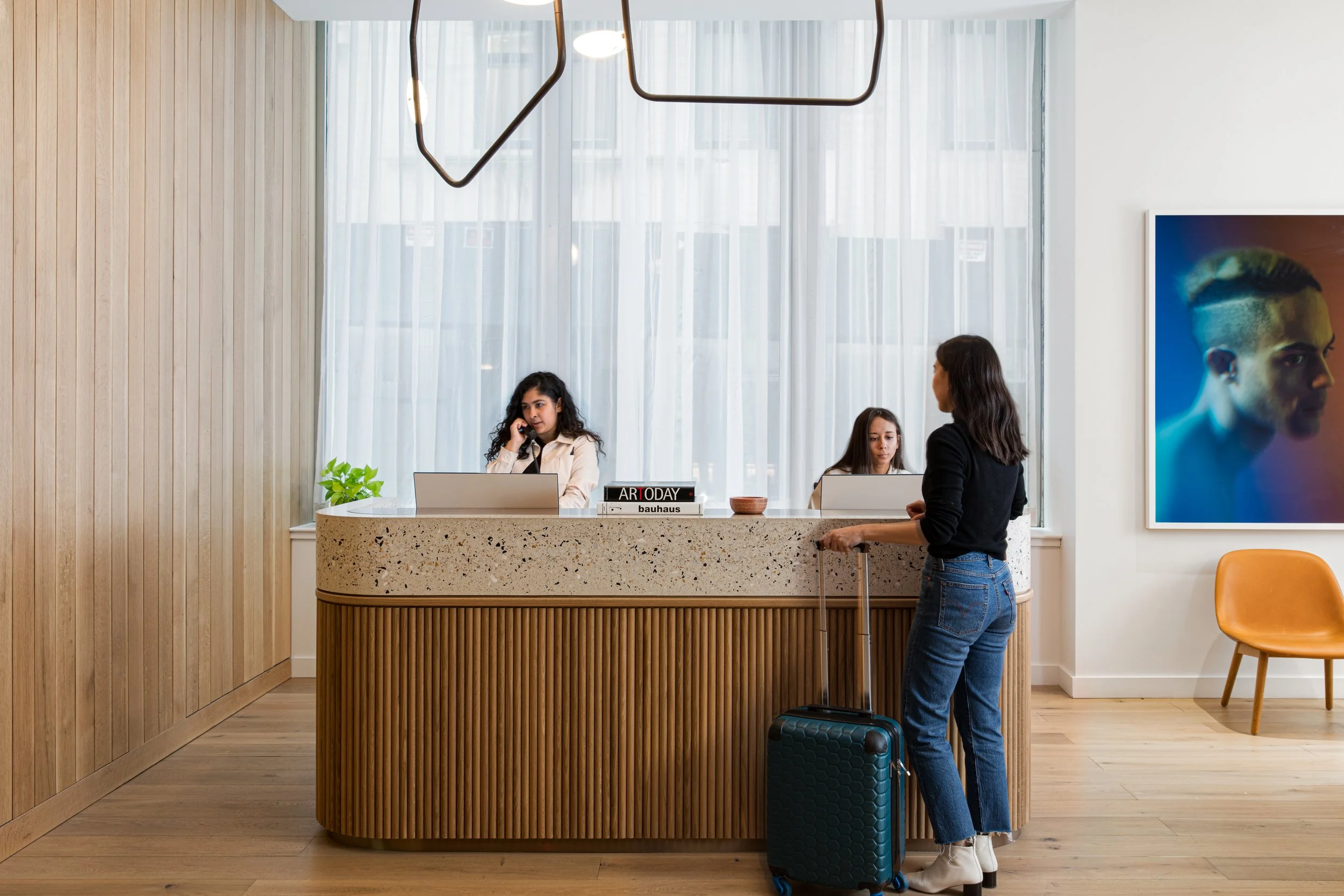 Lyric_70Pine_LobbyCorridors_0129_people.jpg