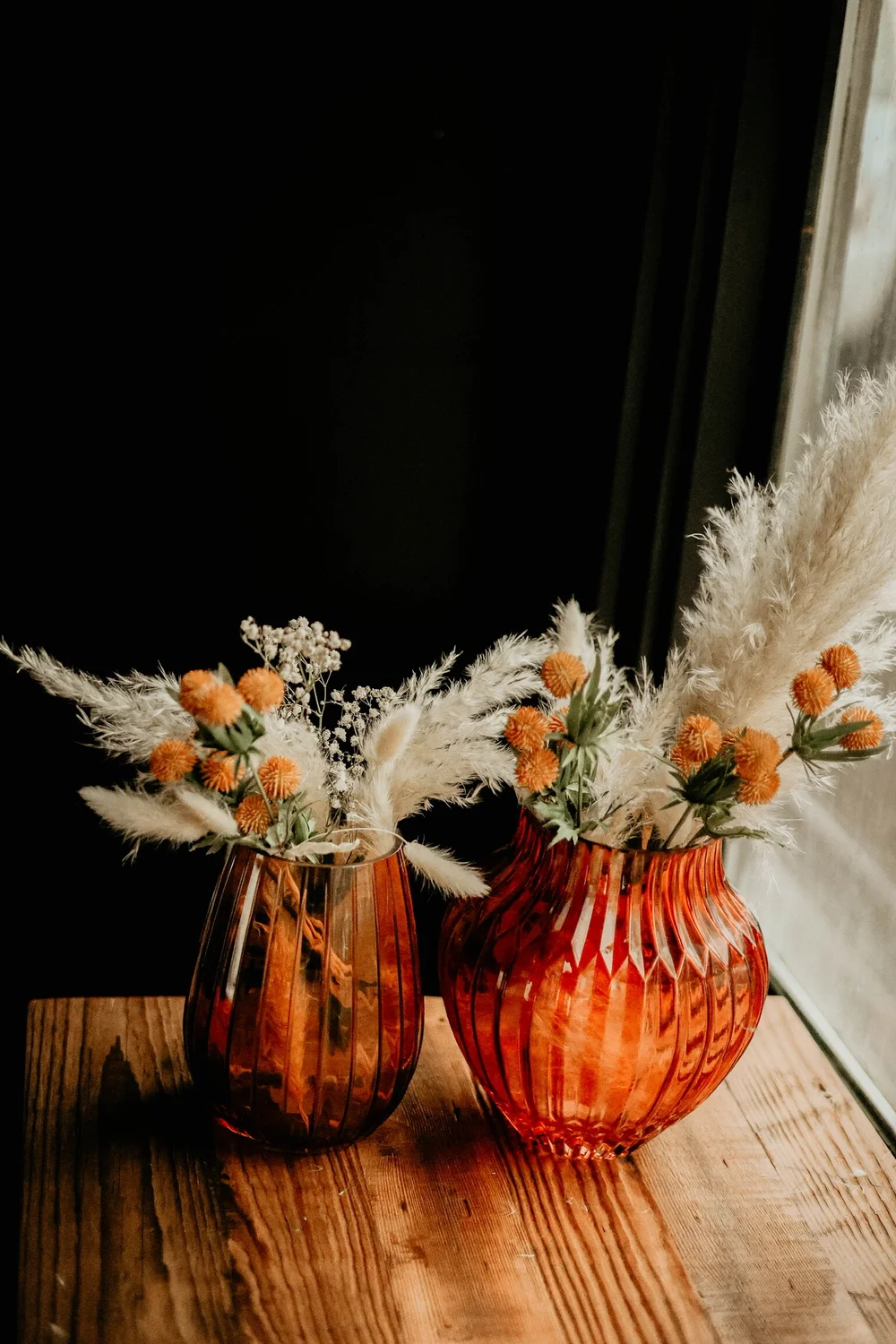 Burnt orange glass vases Dash of Darling Party Co