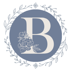 A logo with a large letter 'B' inside a blue circle, surrounded by a decorative wreath of leaves and flowers.