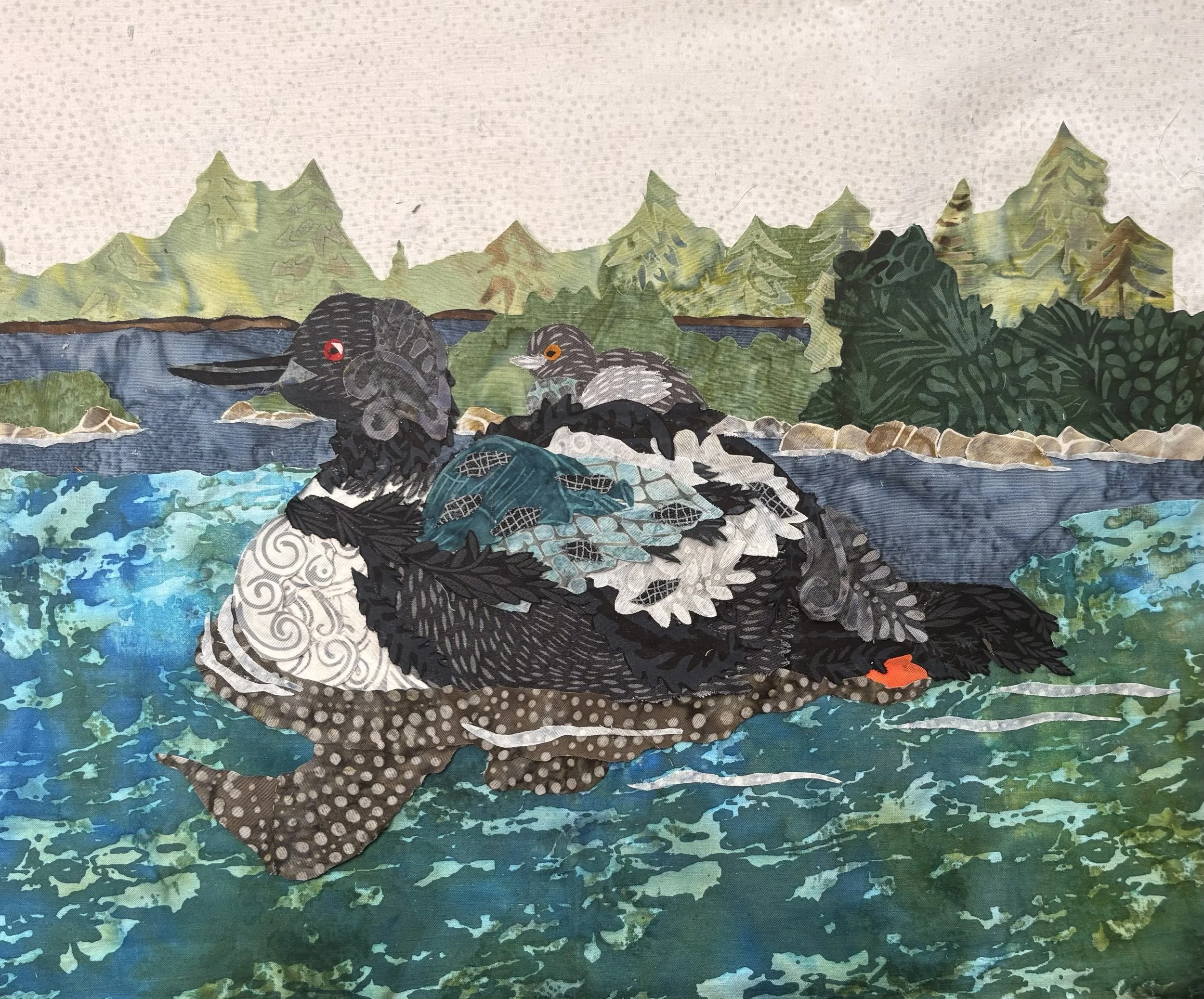 Common Loon with Chick, 2026. 14 x 20 inches; shadow box framed. Commission