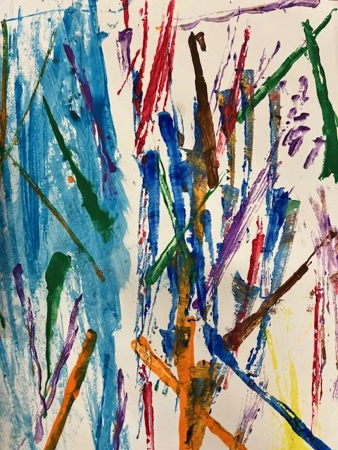 Abstract watercolor painting with splashes of blue, red, green, purple, brown, orange, and yellow on paper.