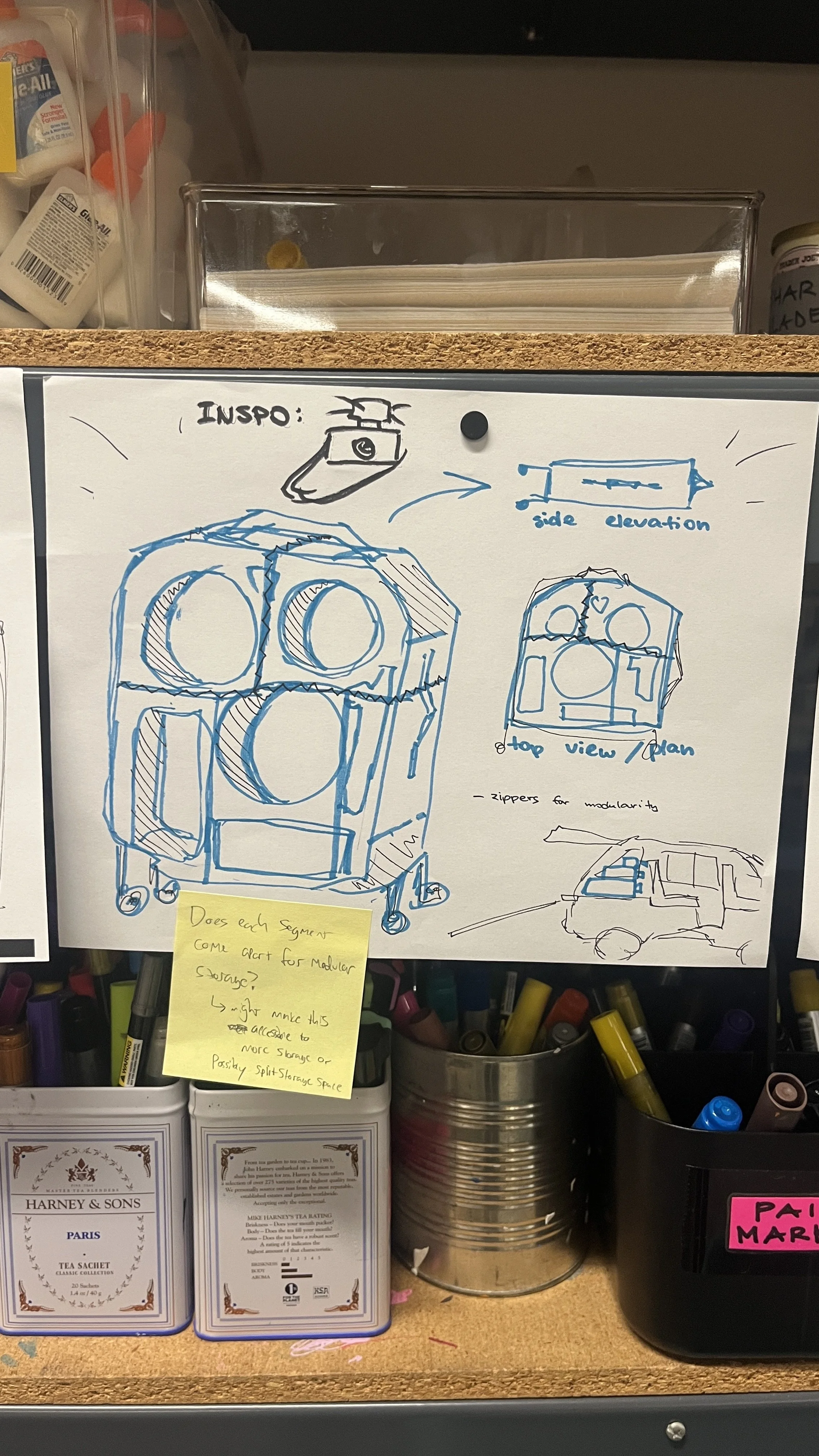 Sketch in blue marker of potential drum case design
