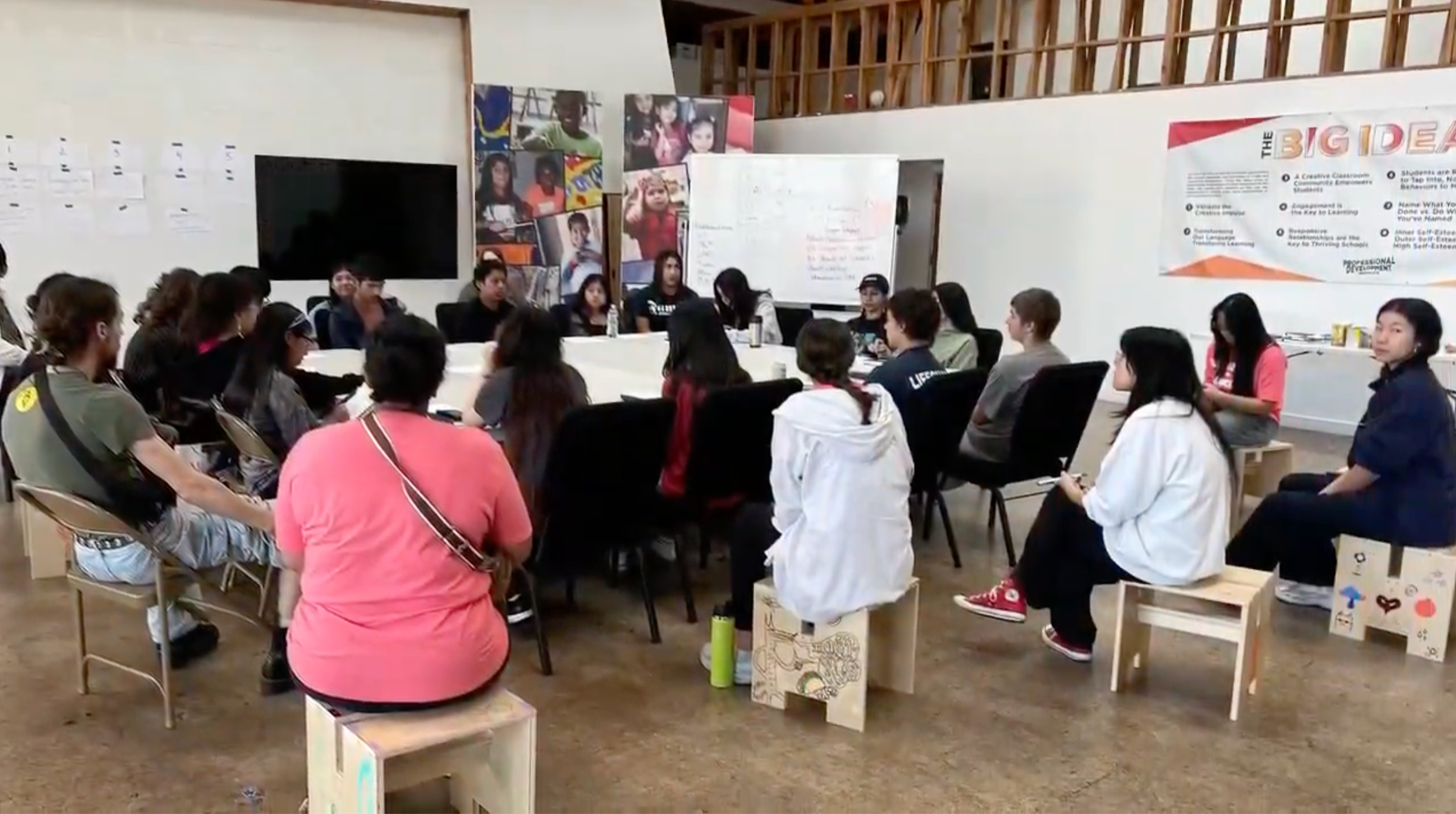 students gathered around a table