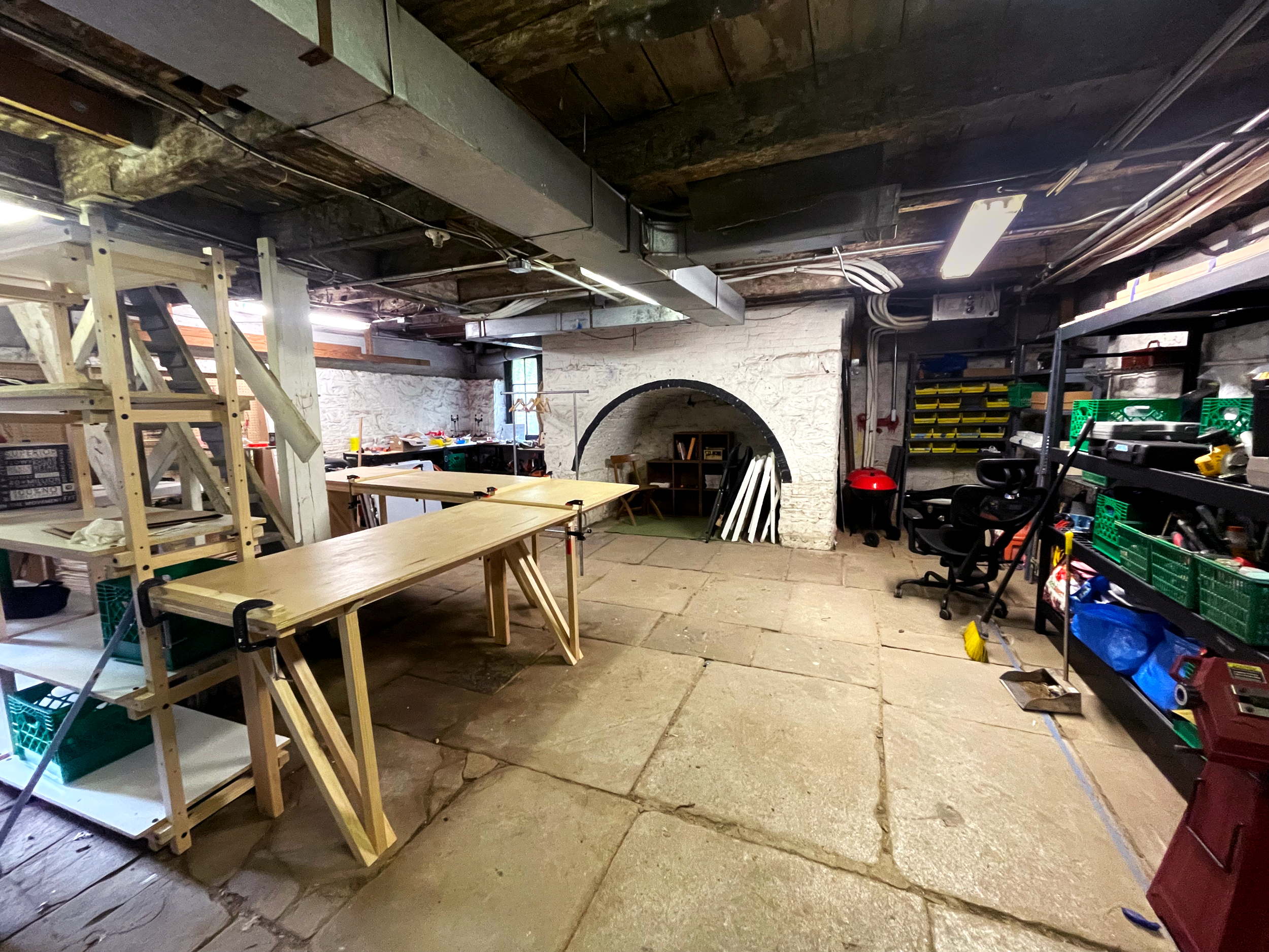 Clean Basement with dedicated work tables