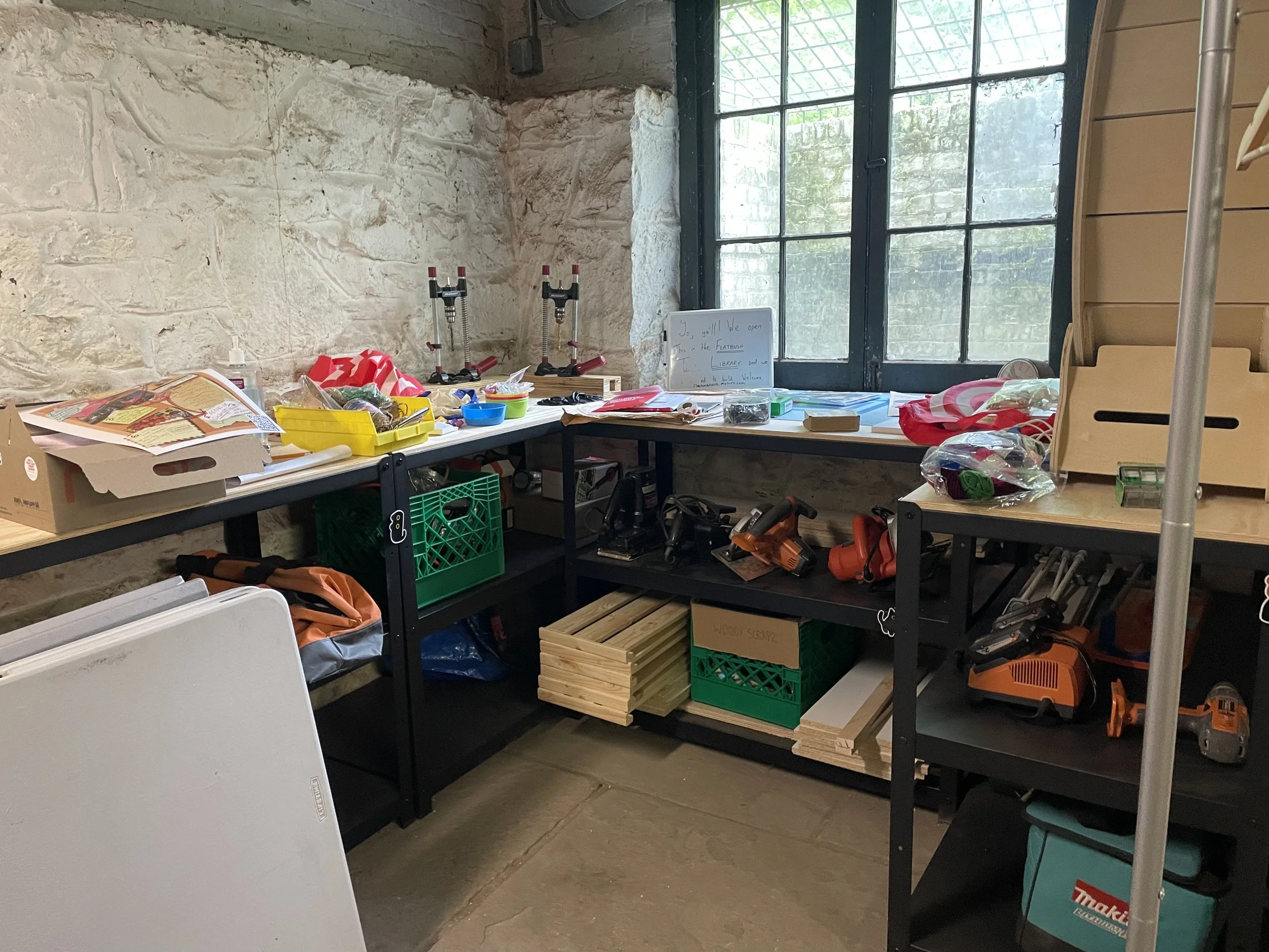 Work tables with tools and additional tool storage underneath