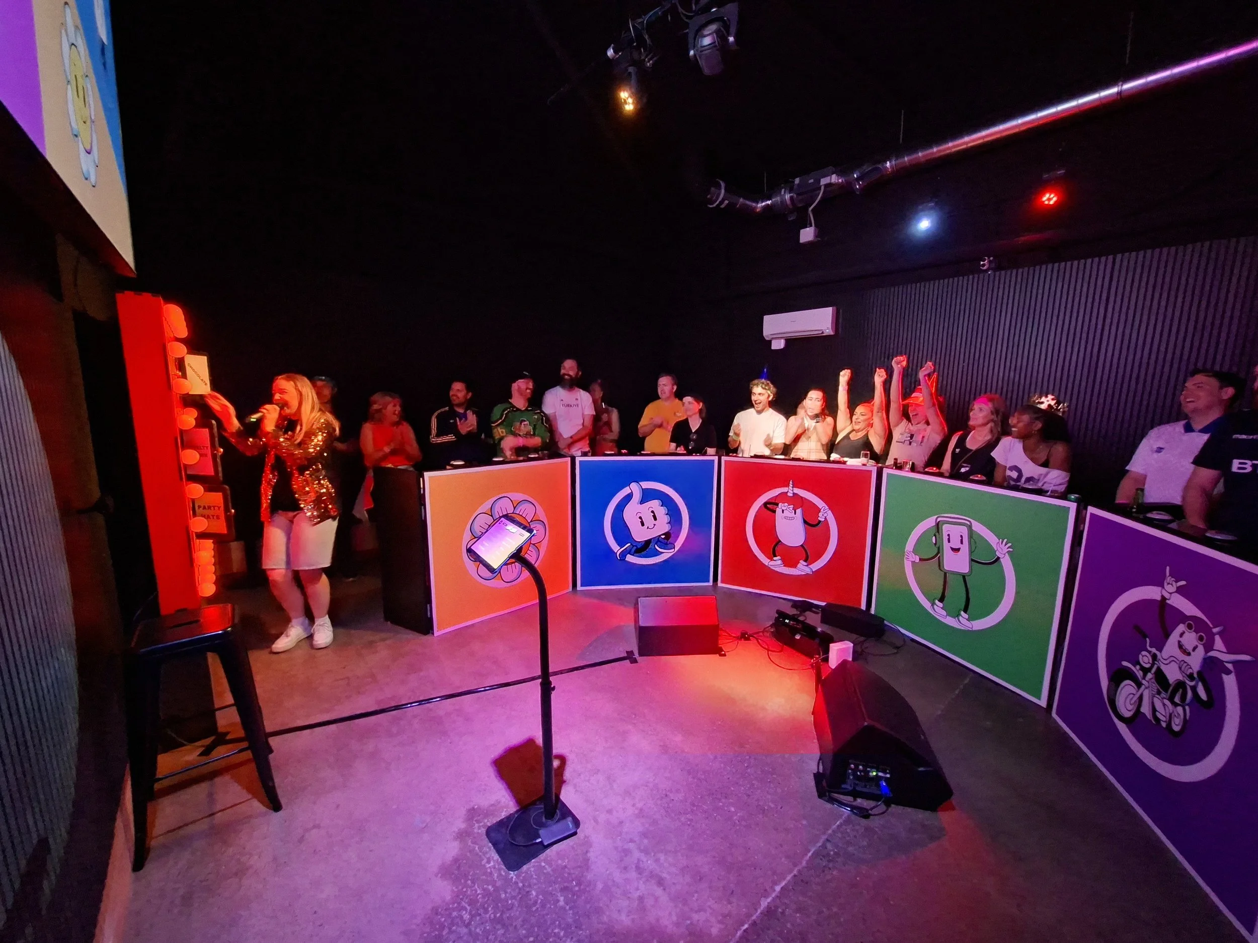 A large team enjoying the Game Show at Serve Social