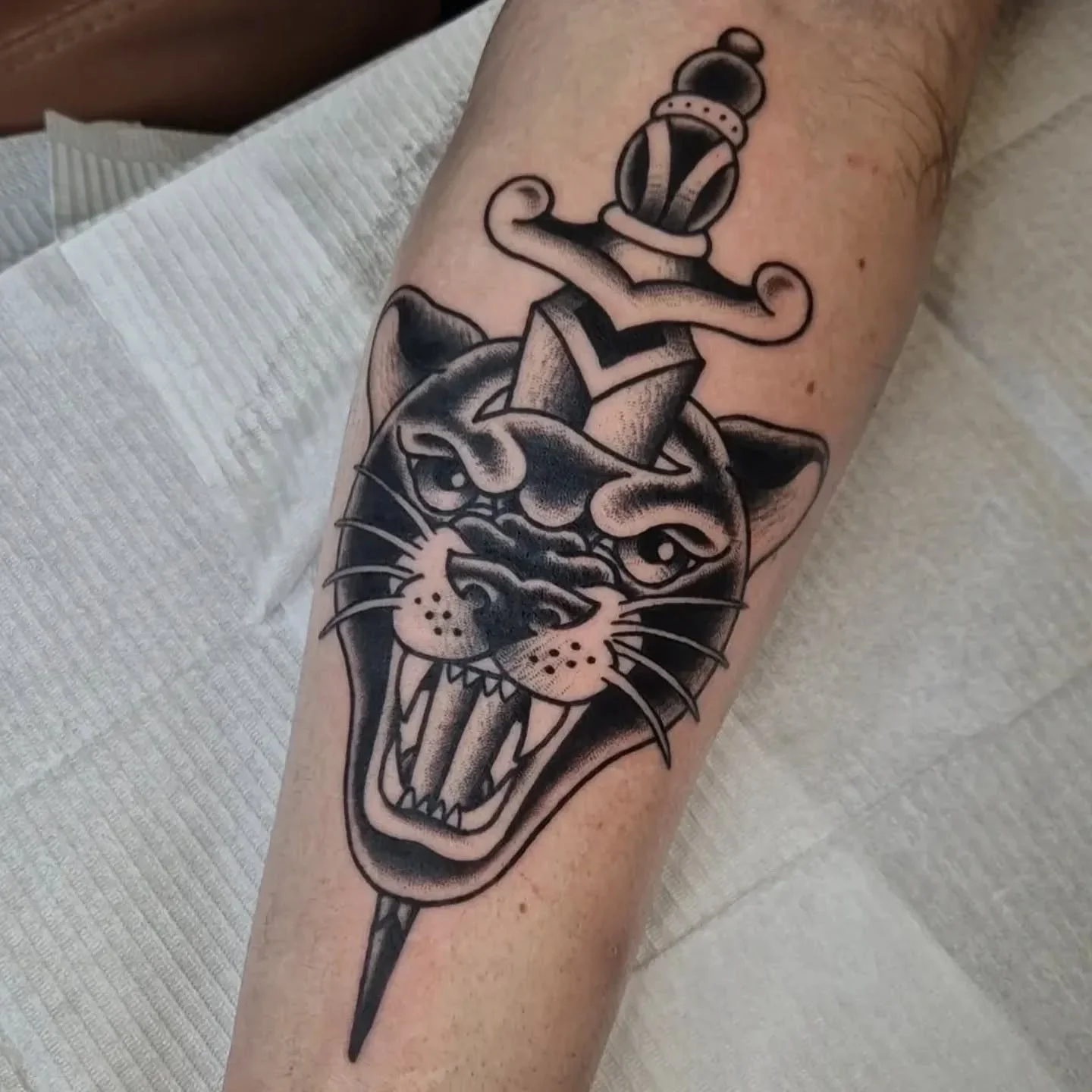 Panther &amp; dagger 🐆🗡 - done by @goodlucktoni

Get in touch if you'd like to book in for a tattoo with Toni! 

📍@wildhorsestattooco Wirral, UK
.
.
.. 
#wildhorsestattooco #traditionaltattoo #uktattoo #uktattooartists #tattoostudio #uktattoostudi