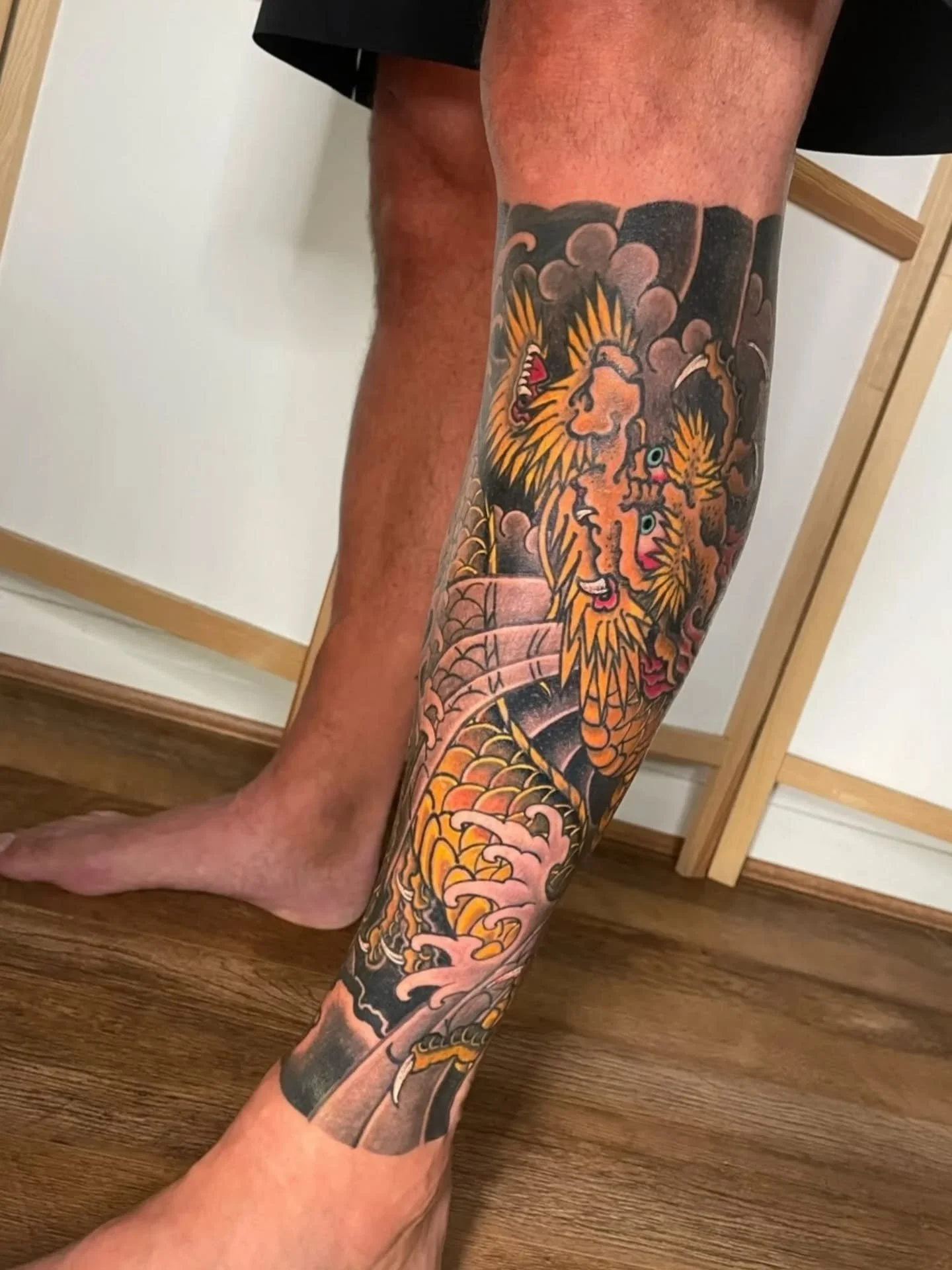 Golden dragon lower leg for Stu 🐉💛 - Done by @dannywildhorses 

This is about 90% complete in the photos with a couple of sections left to finish.

If you're interested in getting some large-scale Japanese tattoos like a sleeve, chest or back-piece