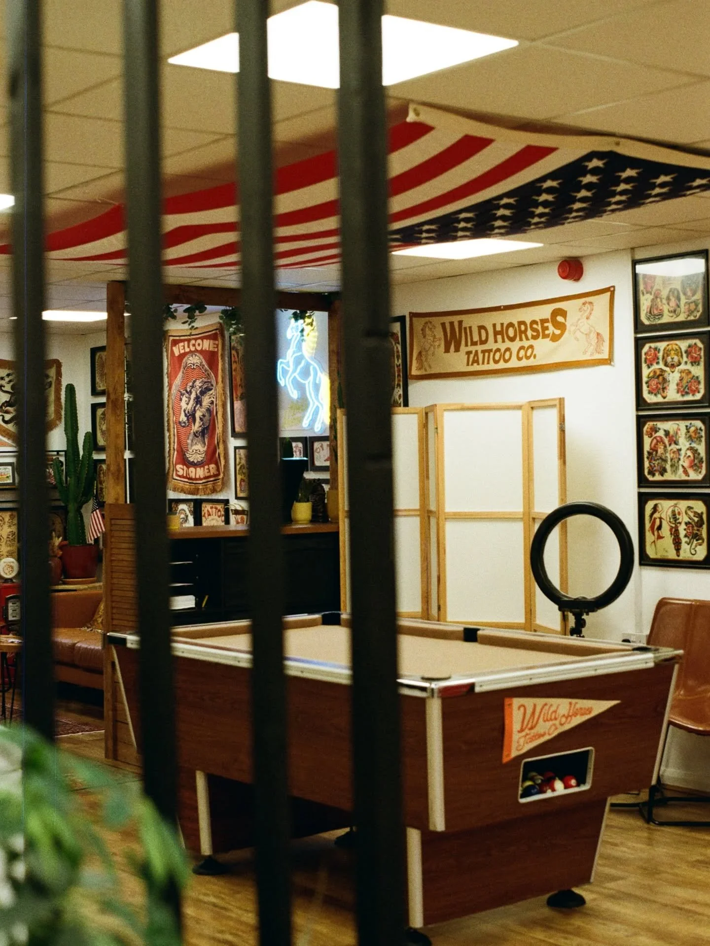 Great shot of the studio by our very own @dannywildhorses 📸 Shot on 35mm film

.

⭐️ Wild Horses Tattoo Co. is an appointment only tattoo studio on the Wirral ⭐️

We&rsquo;re situated at Woodside Business Park, Birkenhead and we&rsquo;re only a few 