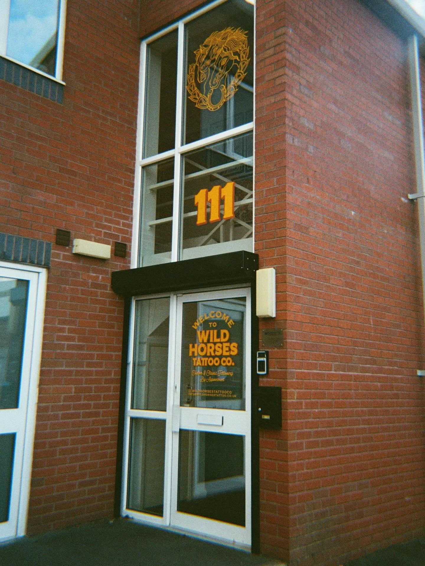 Great shot outside the studio. Taken by @dannywildhorses 📸 Shot on 35mm film 

Situated at Woodside Business Park, Birkenhead, Wild Horses Tattoo Co. is only a few minutes&rsquo; walk from Hamilton Square train station.  If you&rsquo;re reaching us 