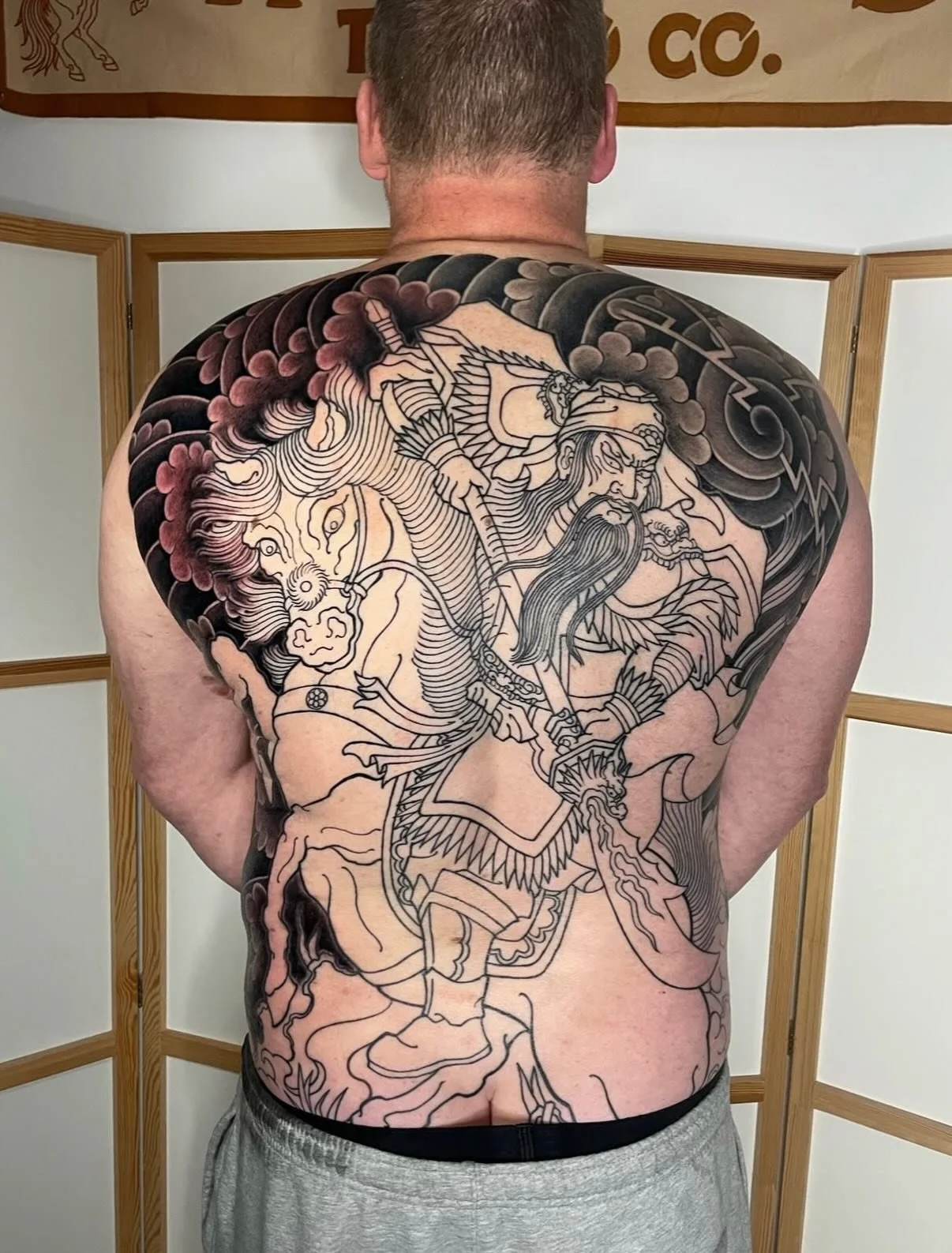 A work in progress on for Rich💪 His first tattoo at 58 🙌 Left side background is freshly done, right side background is healed.

By @dannywildhorses 

If you&rsquo;re interested in getting some large-scale Japanese tattoos like a sleeve, chest or b
