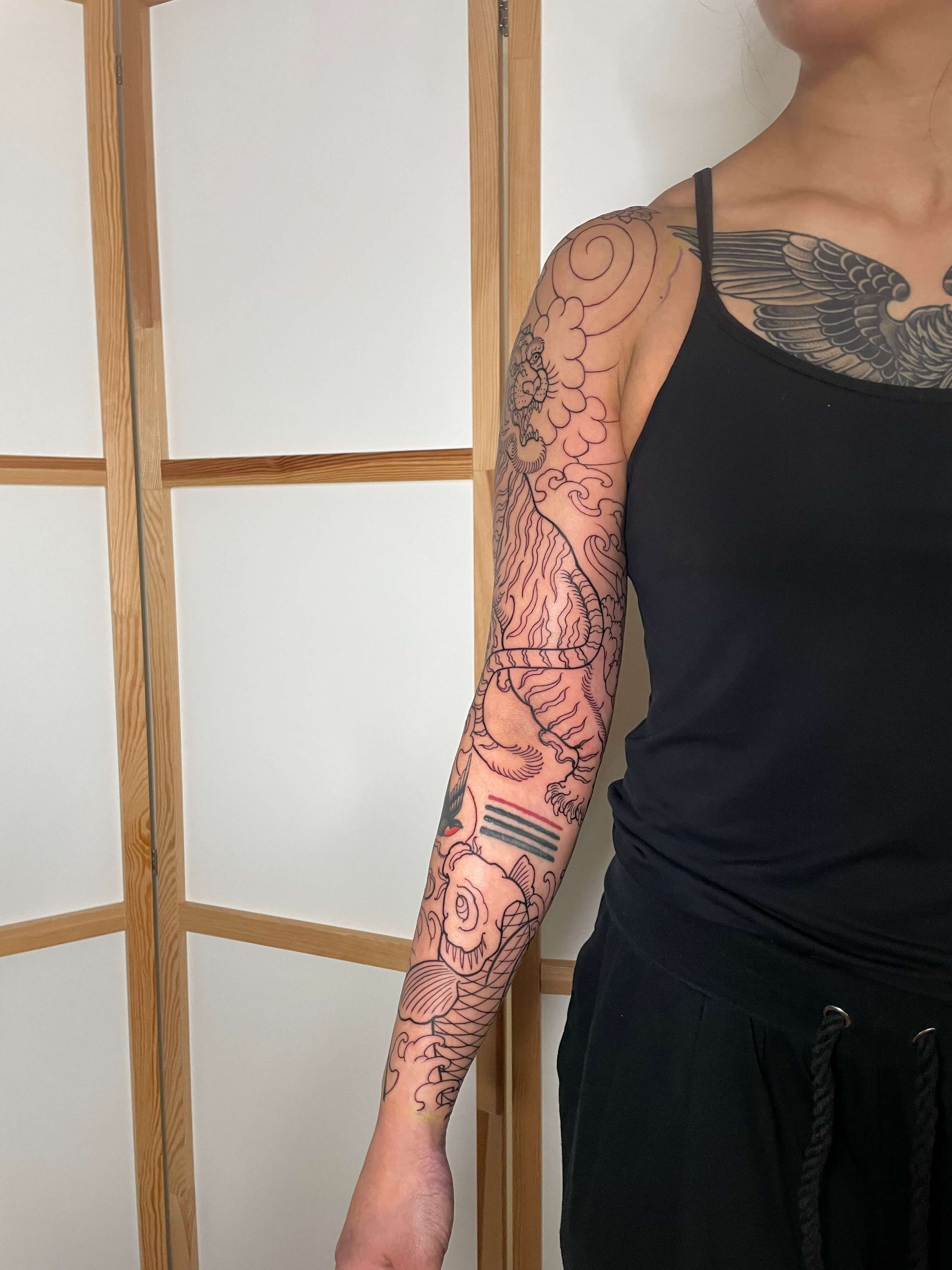 female-japanese -tattoo-sleeve-uk.jpeg