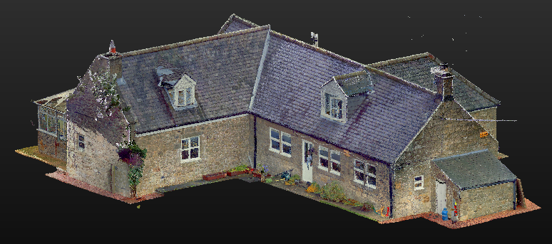 3D scan model of a traditional stone house with a steep roof and dormer windows