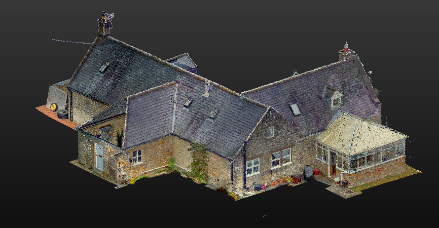 3D scan model of a large rustic house with multiple roofing sections and a front sunroom