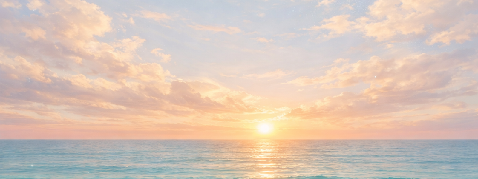 Sunset over the ocean with sky filled with clouds.