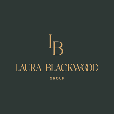 Logo with gold text on a dark background reading 'LB LAURA BLACKWOOD GROUP'. Hampton Roads Top Real Estate Teams, Virginia Beach top Real Estate Teams