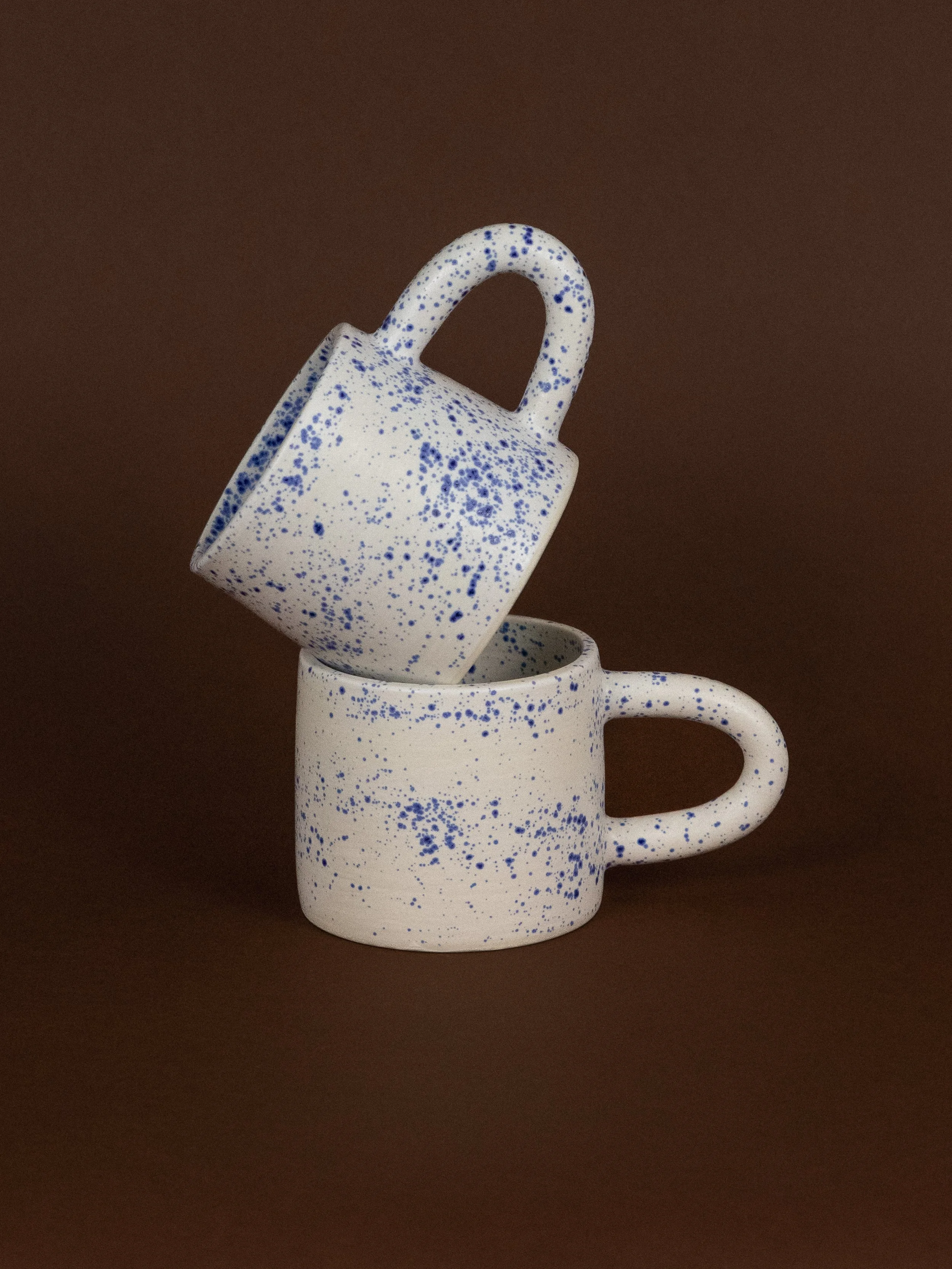 Blue speckle mug handmade by Natalya Jane Ceramics