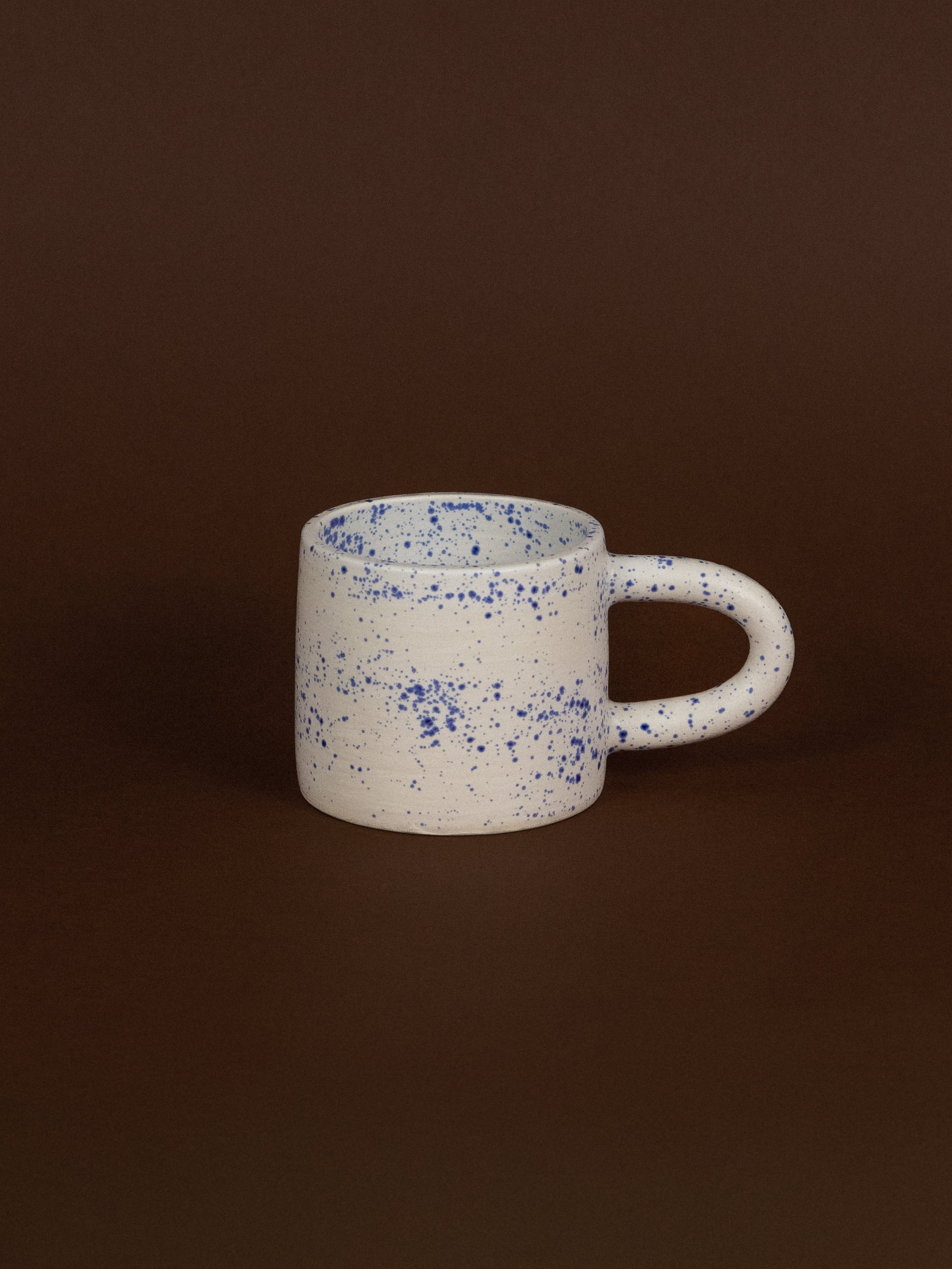 Blue speckle mug handmade by Natalya Jane Ceramics