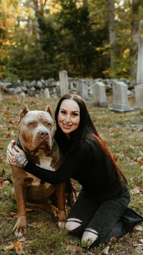 Ruthie smiling with her pitbull dog with defined brows and lashes