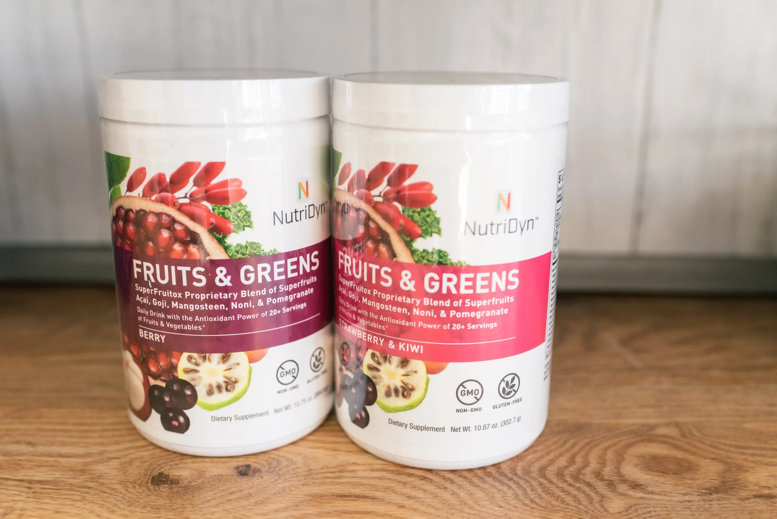 Large tubs of fruits and greens power supplements