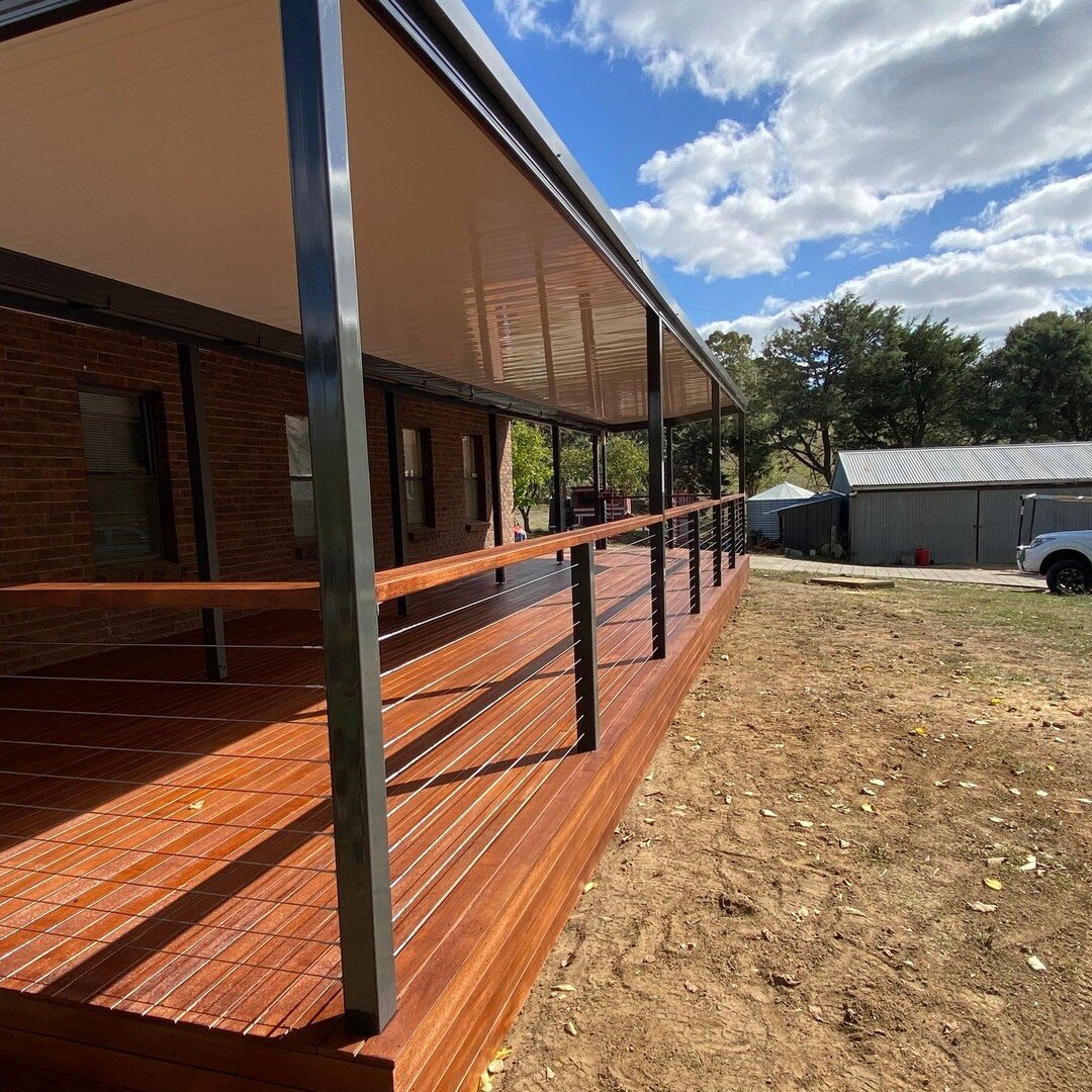 A Monument &amp; classic cream verandah with a beautiful hardwood Kapur timber deck and a stainless steel wire balustrade adds the perfect touch.

Could we help with your next project?