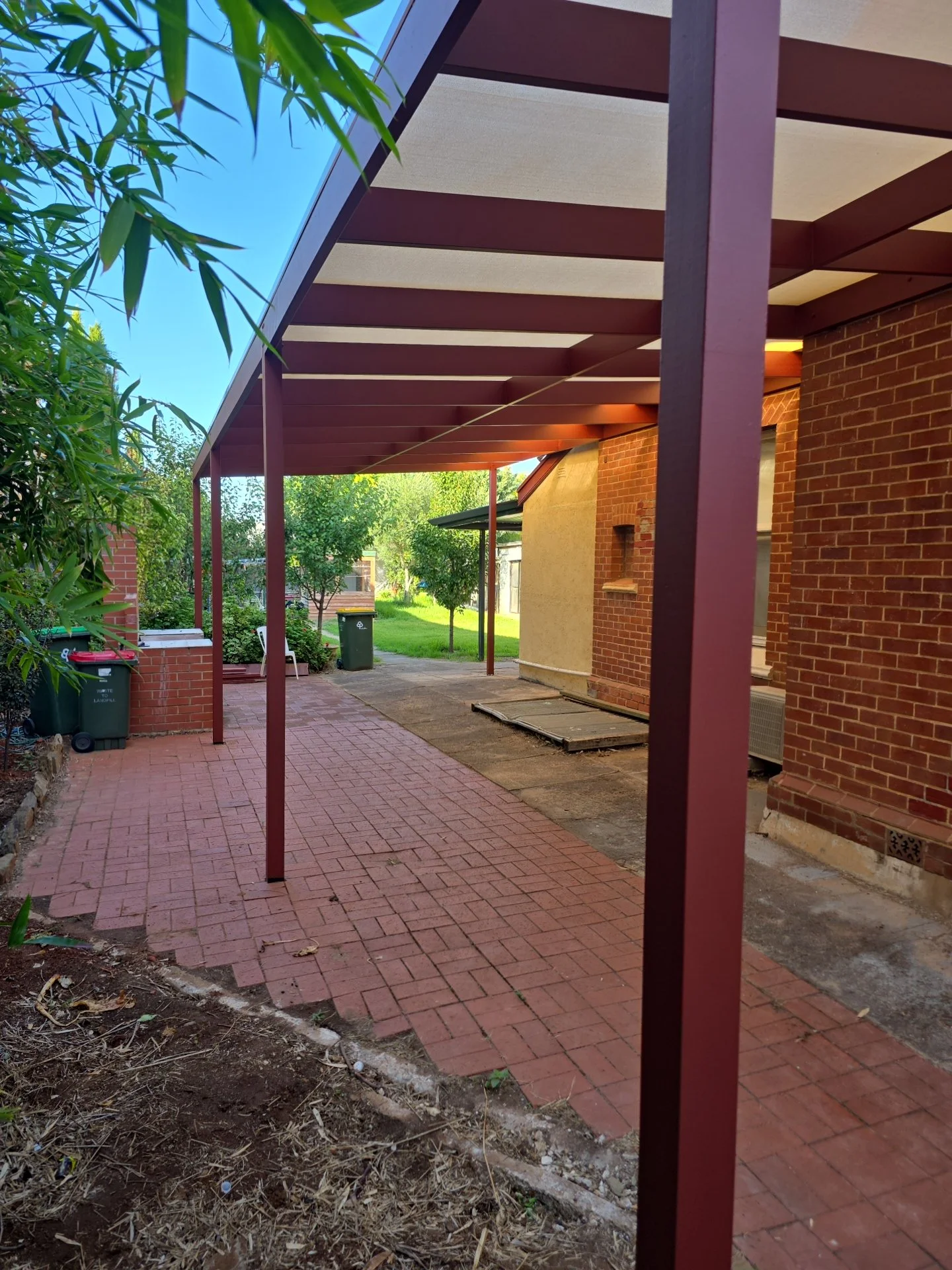 timber verandah on a red brick house