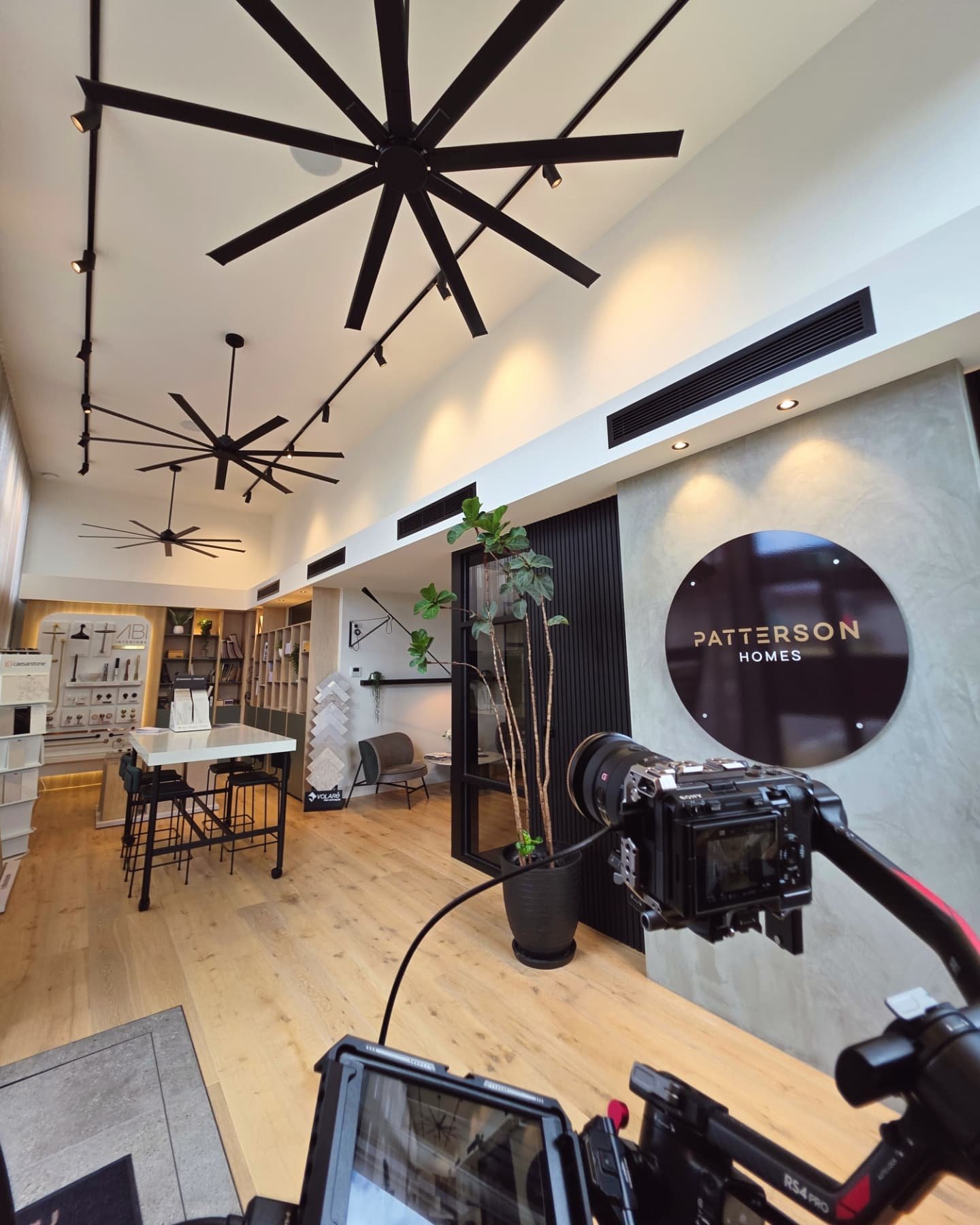 Epic day filming with the amazing team at @pattersonhomesmelbourne ! 🎬 From their sleek offices &amp; showroom to their stunning high-spec display homes, it's been a blast capturing their vision. So much fun collaborating with this extended team to 