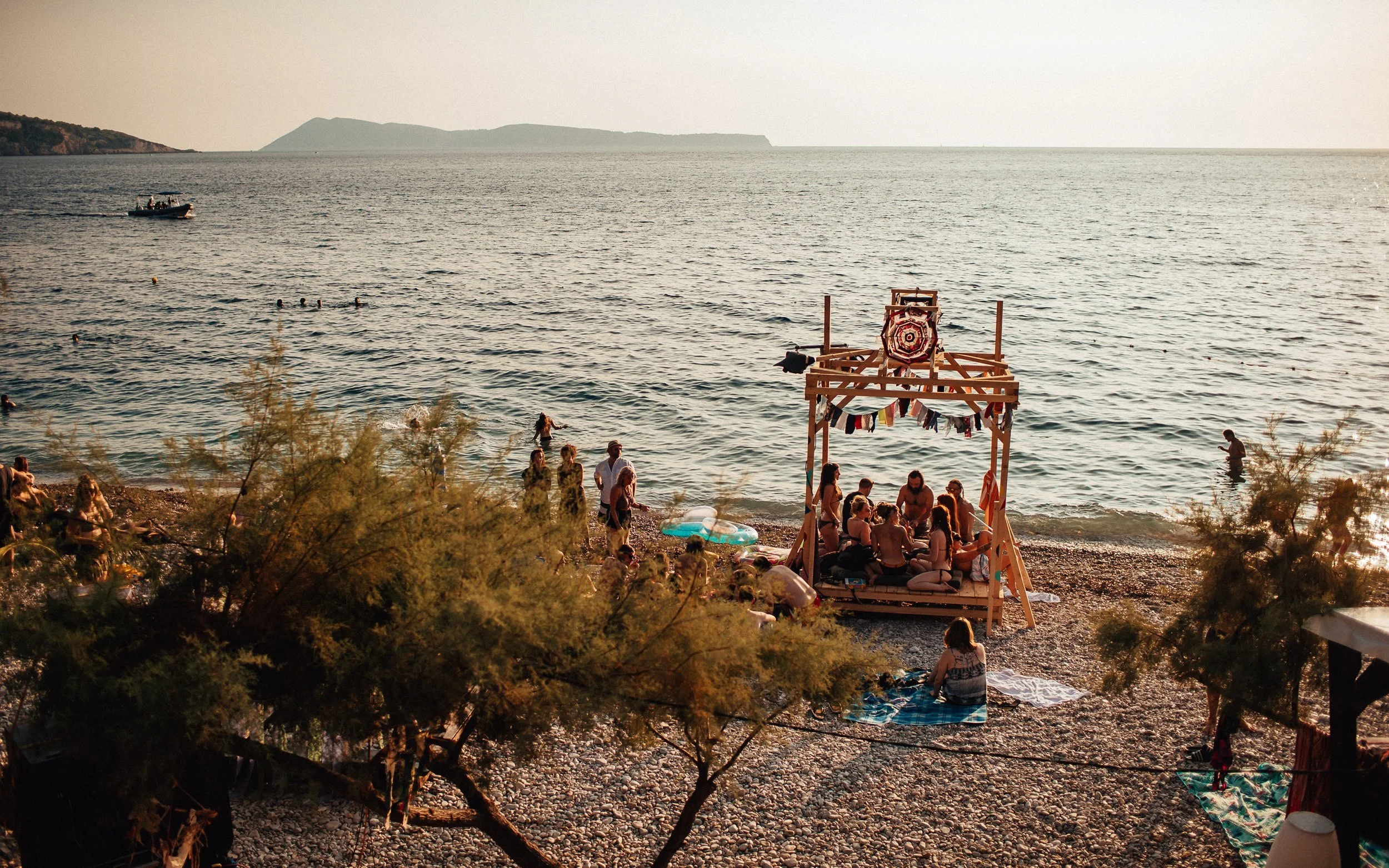  people relax on the beach in the afternoon music festival in Croatia