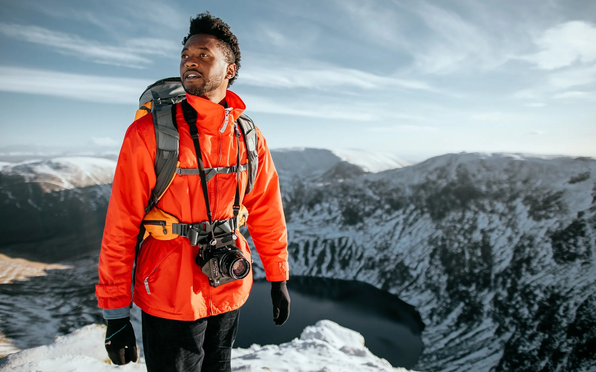  man, climbs a mountain in snow, Lake District