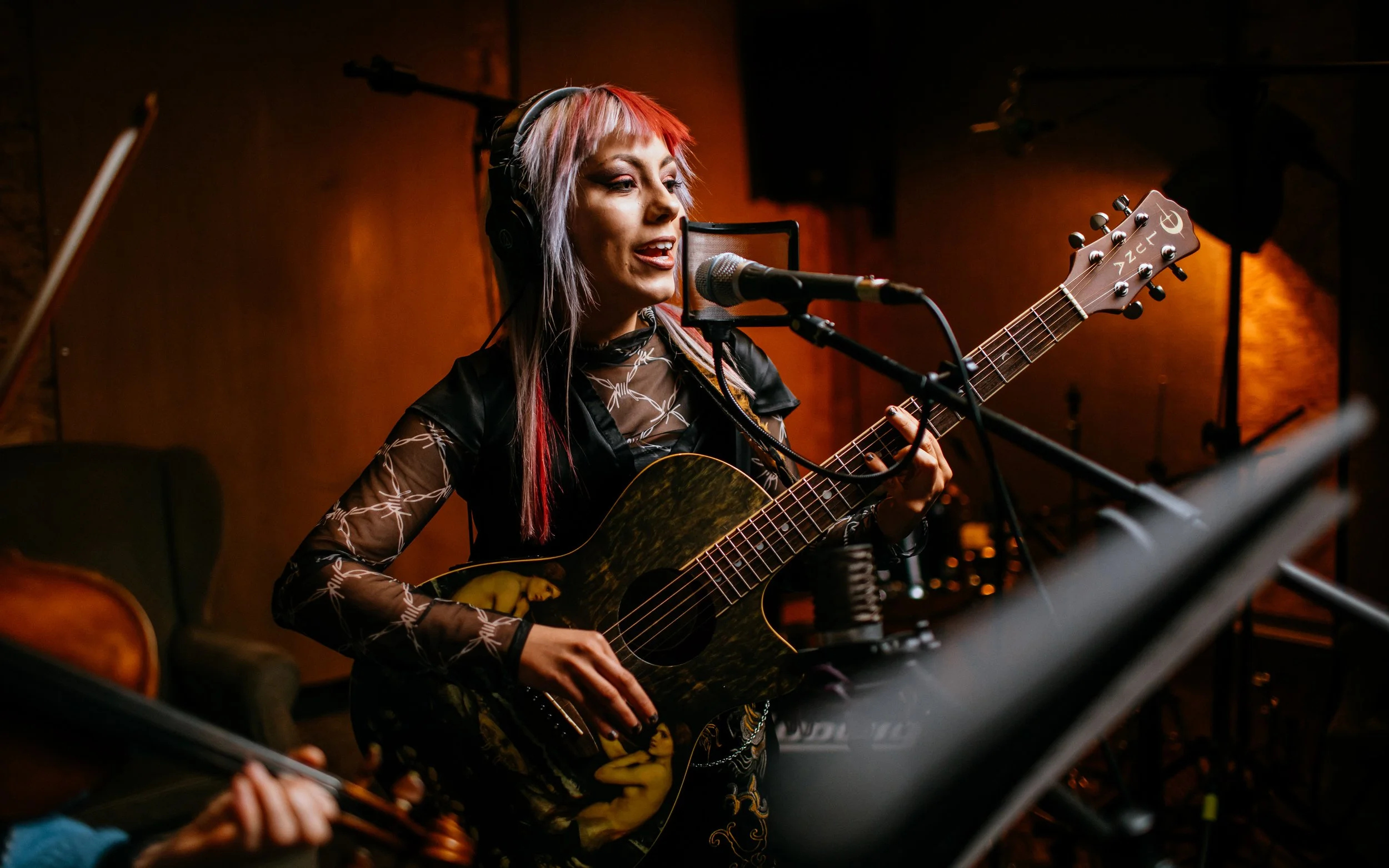  girl, playing guitar, a music studio
