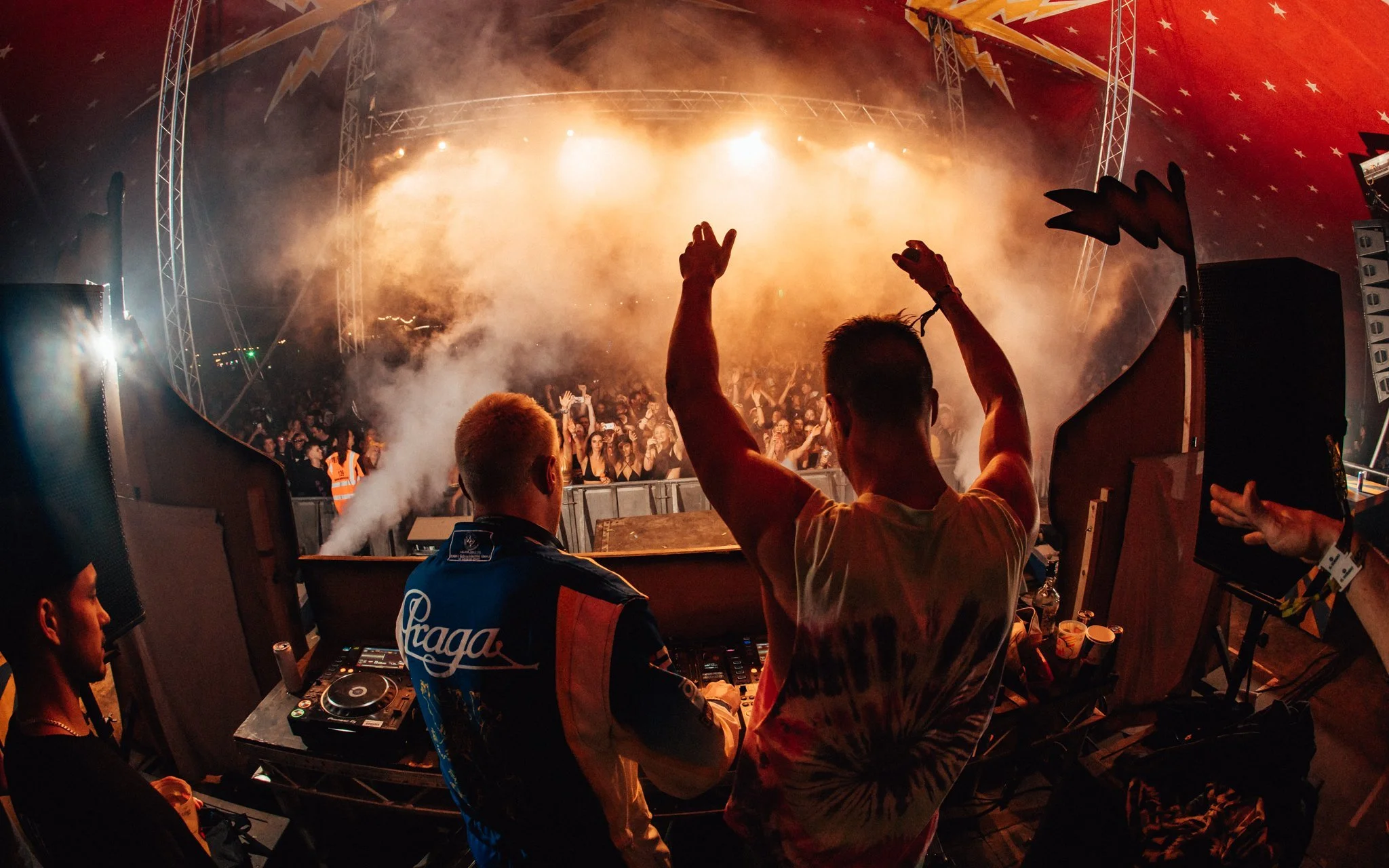  dJs drop an epic track, at music festival