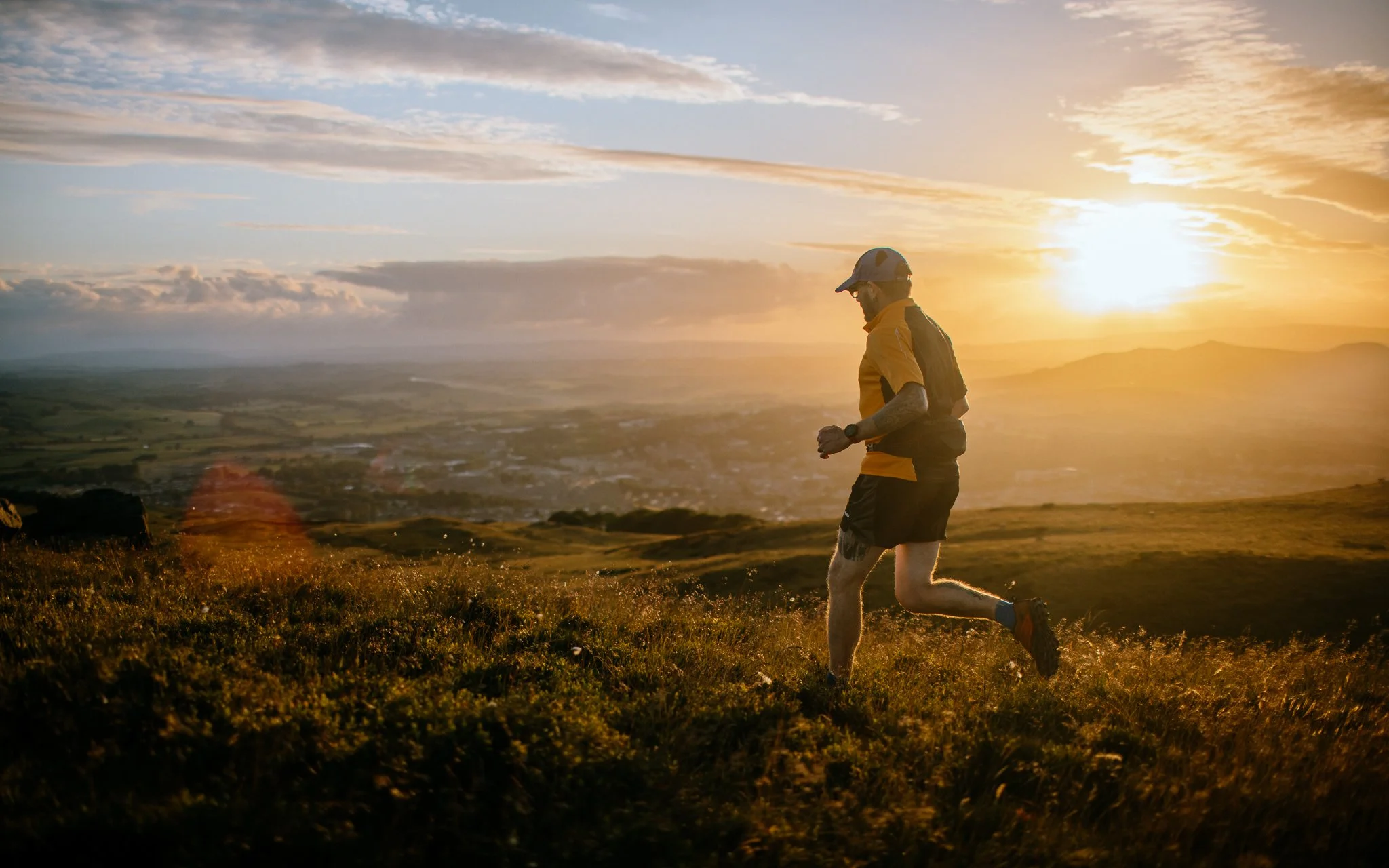 fell Runner, running in sunset, above Skipton