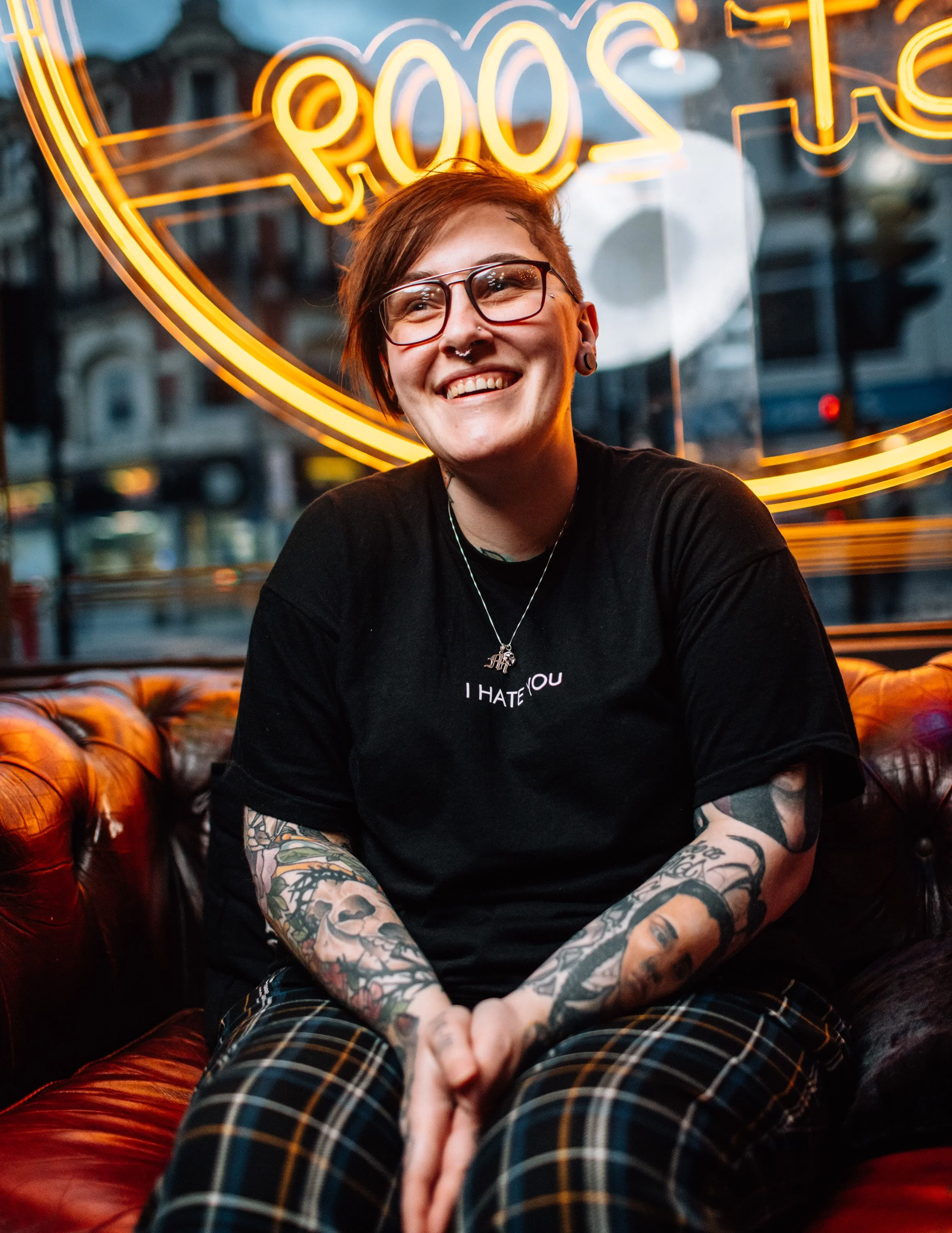  girl, sits on sofa portrait