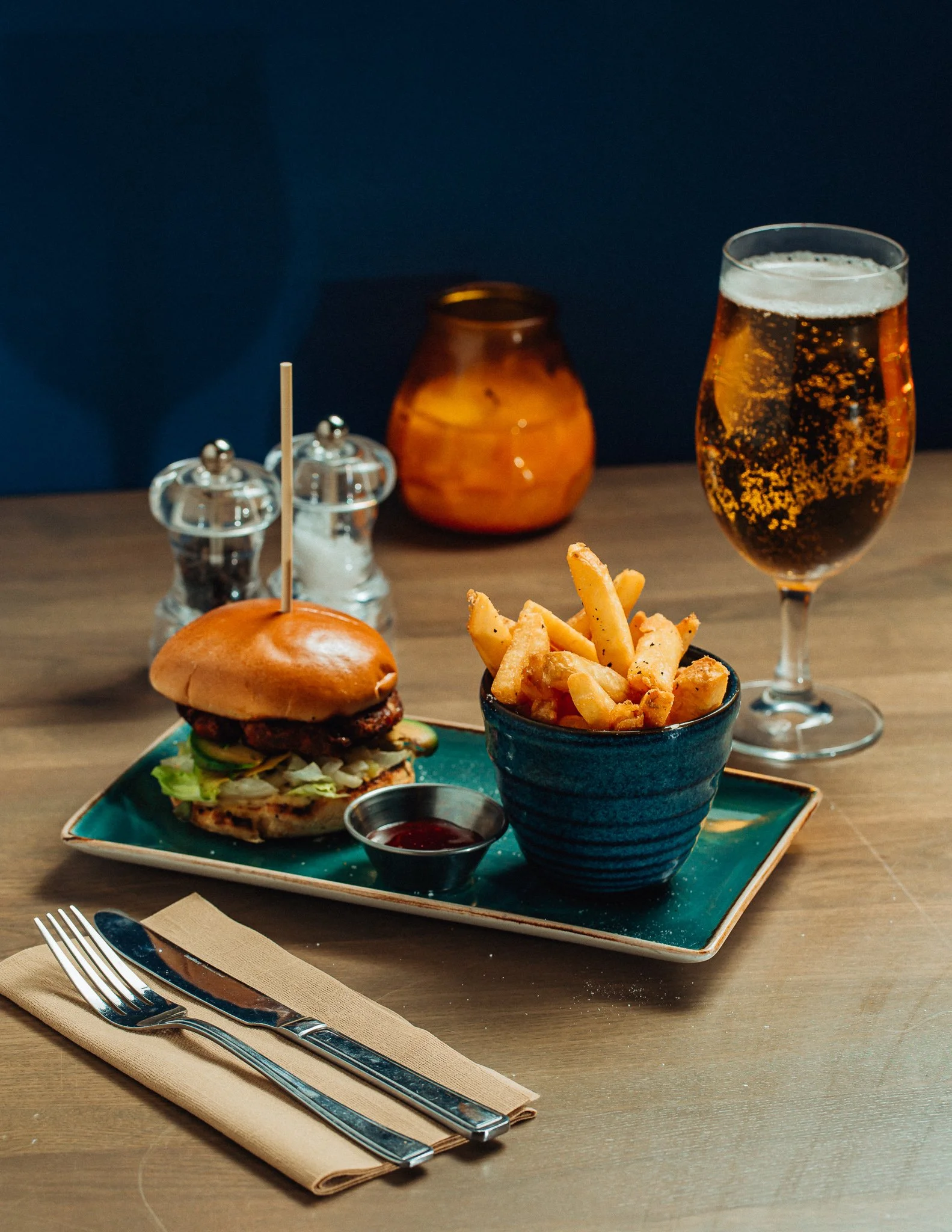  a burger, chips, and beer