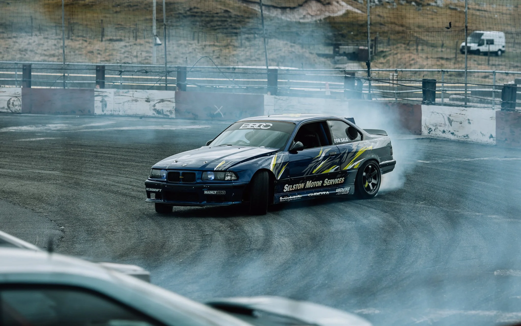  a BMW drift car drifts on track