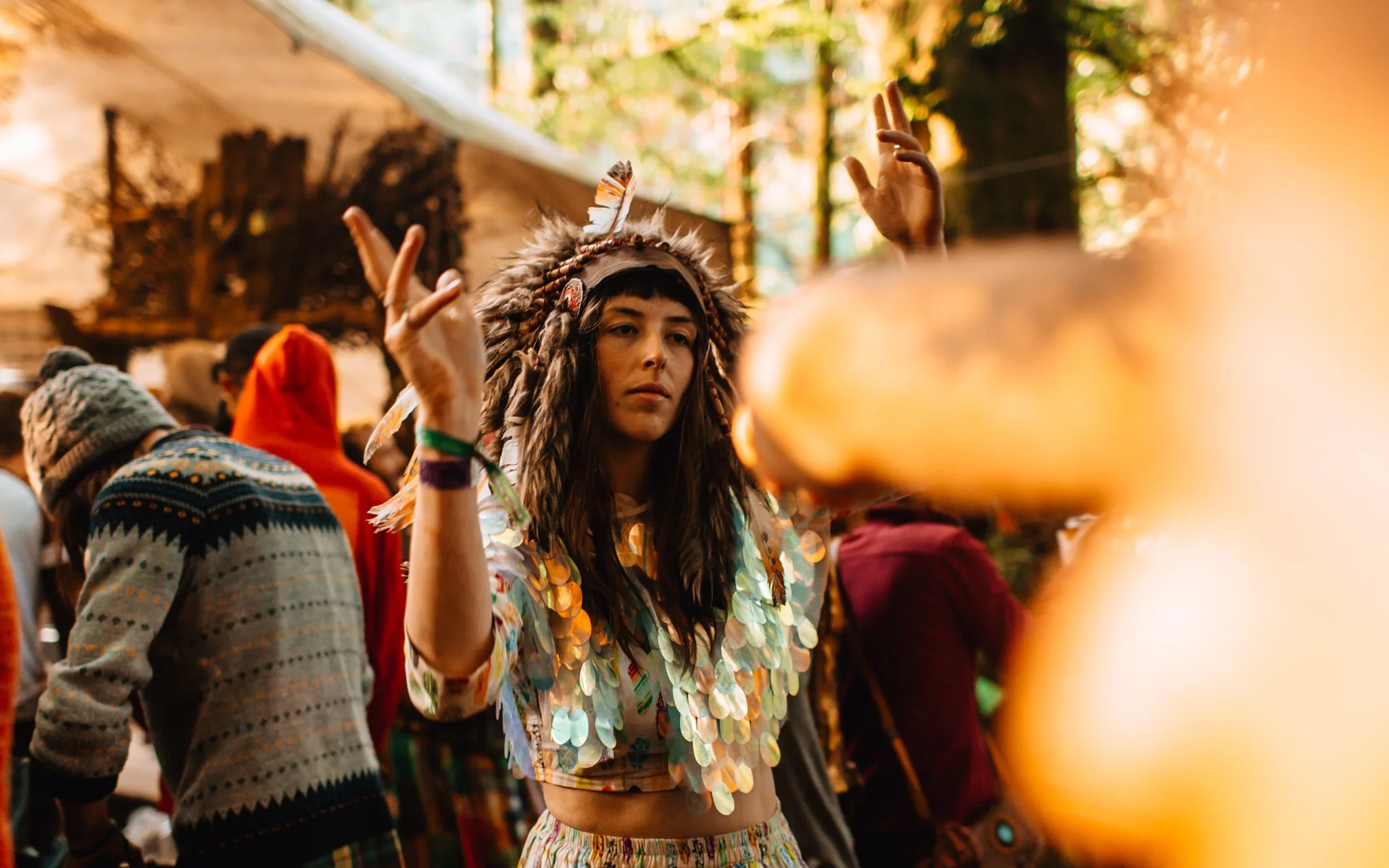 girl, dancing with glittery outfit at music festival