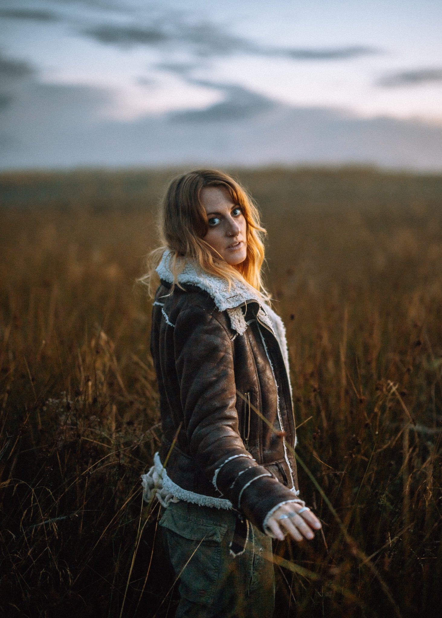  girl in grassy field Scotland