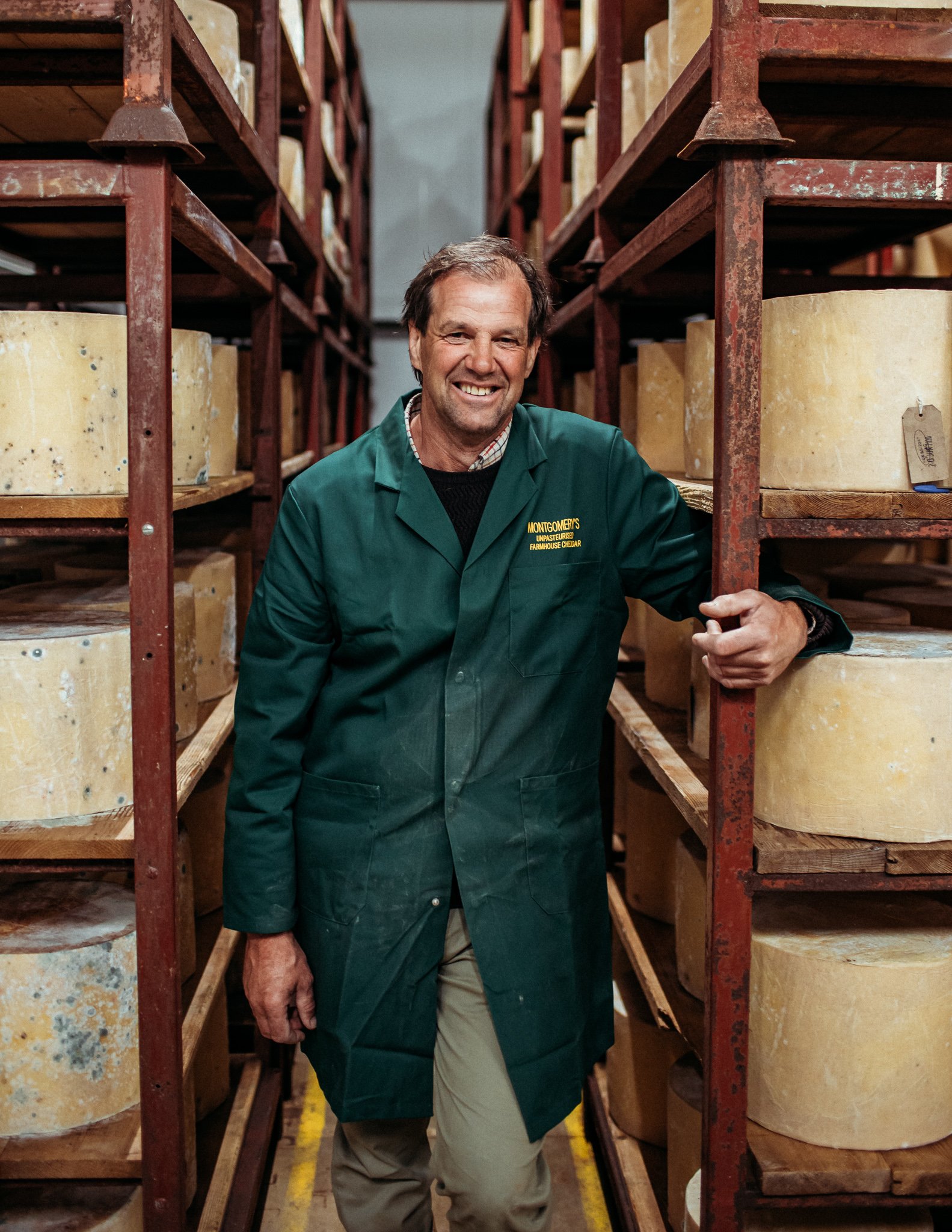  portrait of man at cheese factory