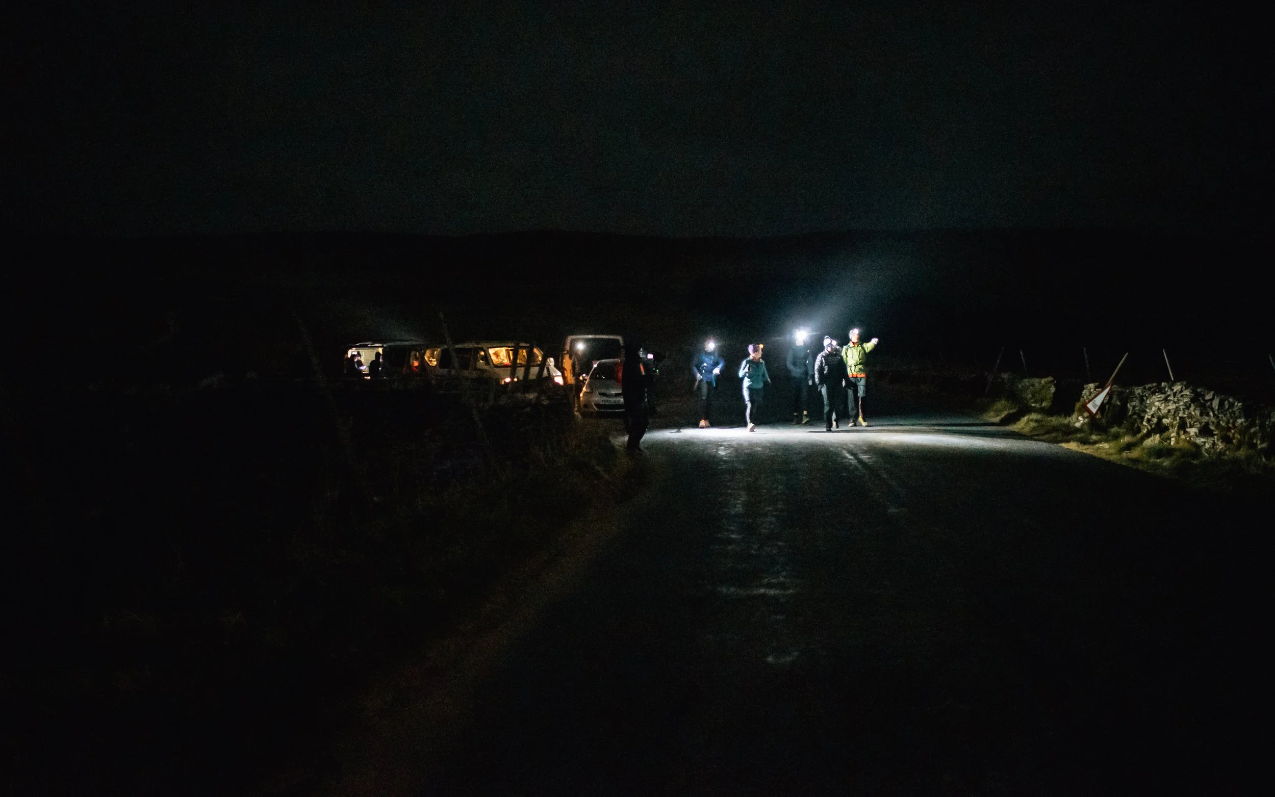  fell runners running at night