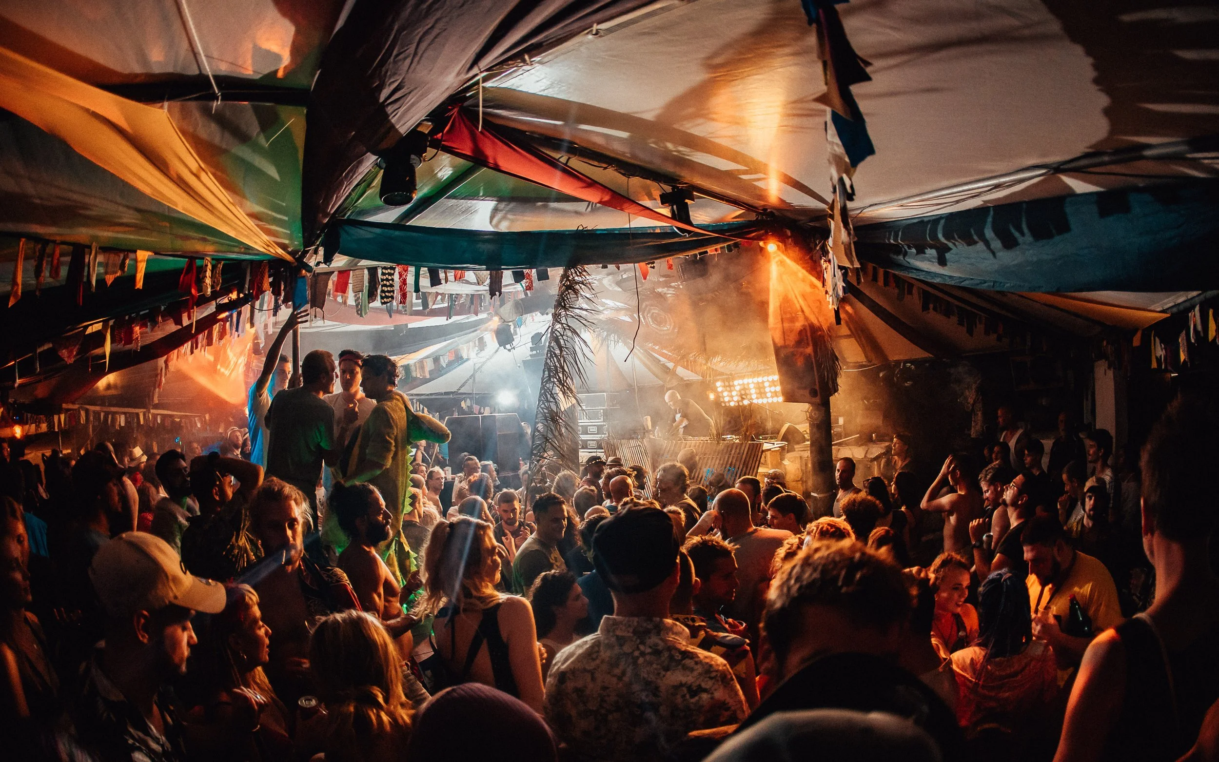  a crowd dancing at a music festival in Croatia