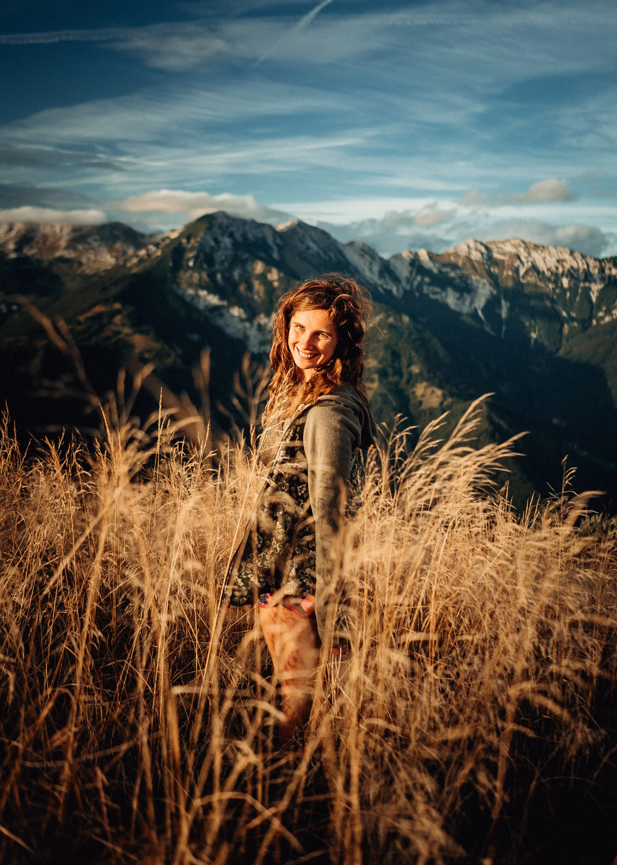  girl, stands on mountain in Slovenia