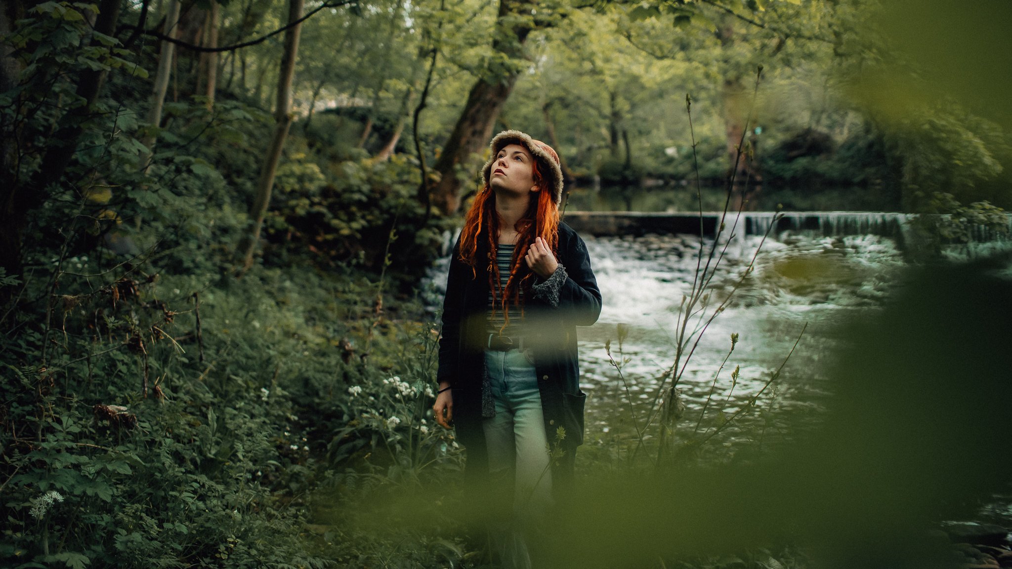 Girl stands in Woods Hebden Bridge