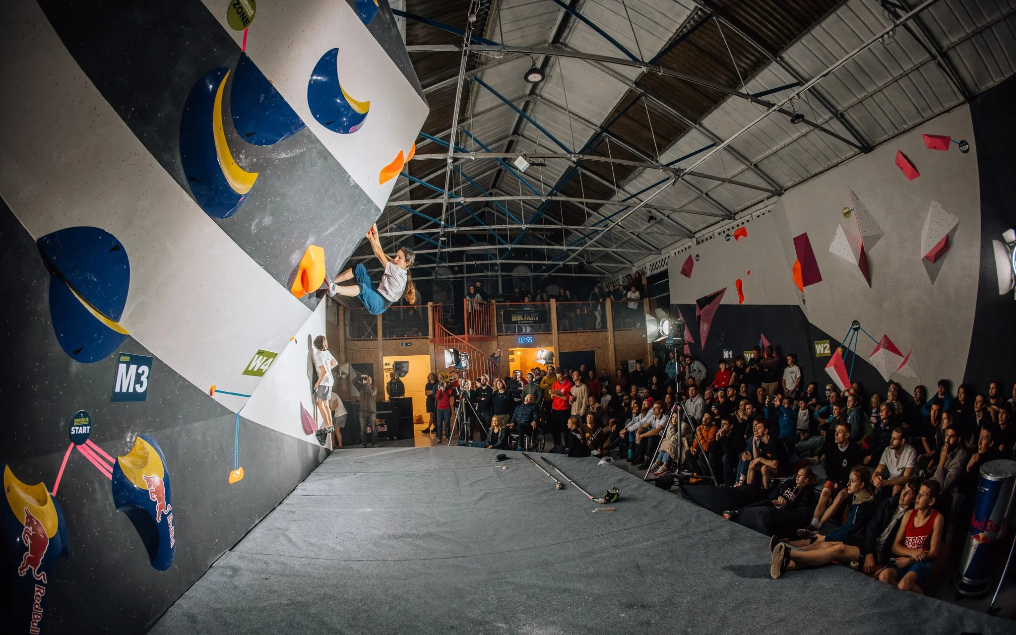  climate attempts bouldering problem during competition