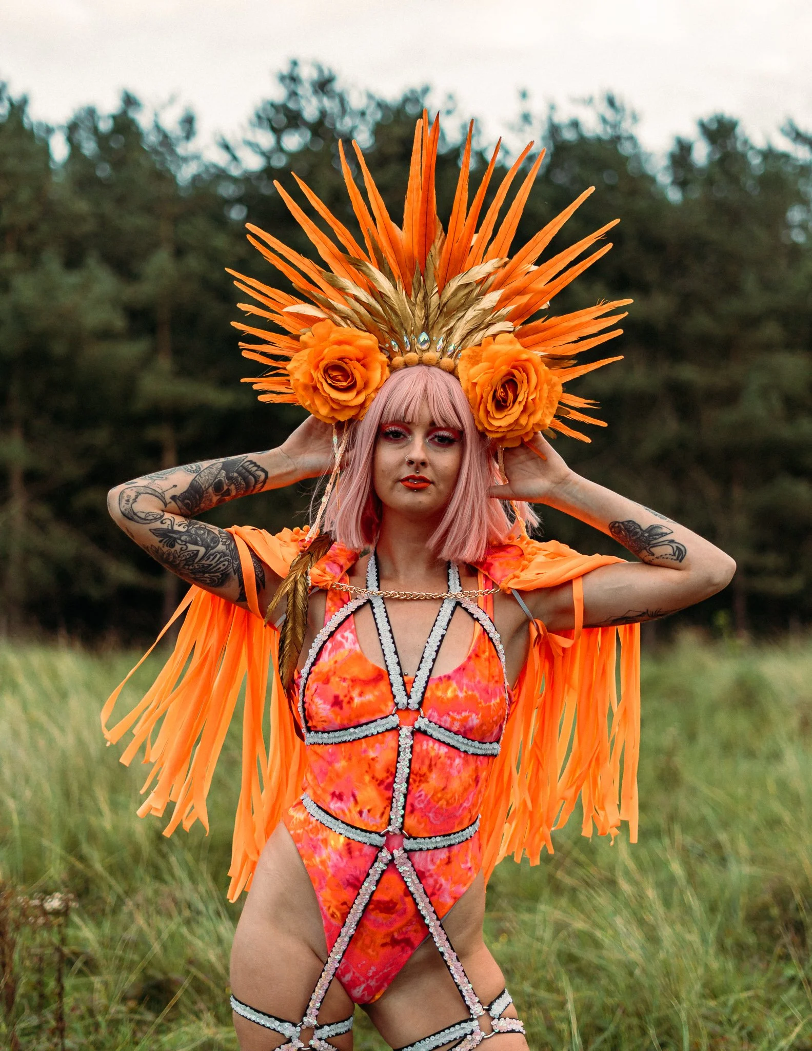 Girl poses with big headdress