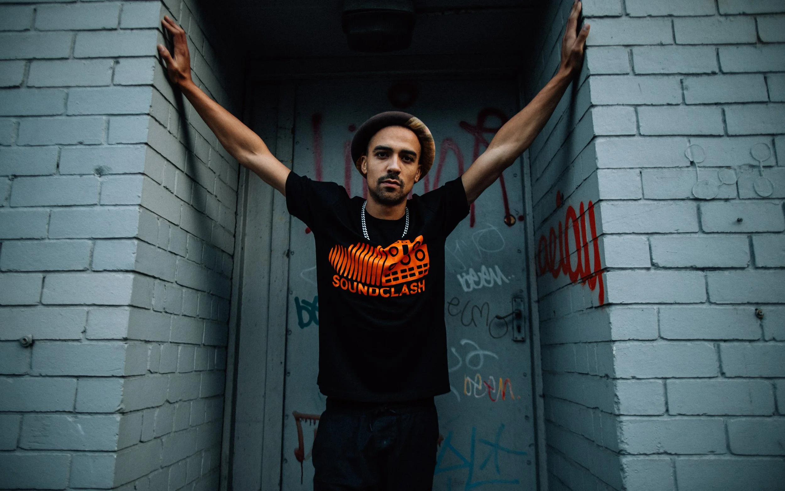  man poses in doorway