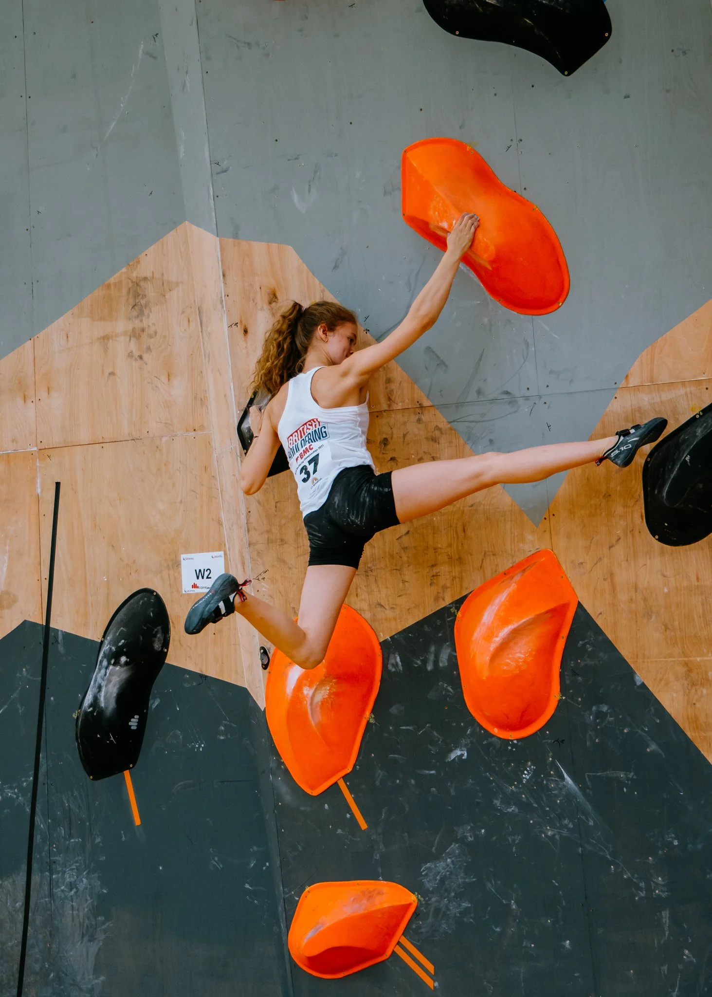Female climber at British bouldering Championships