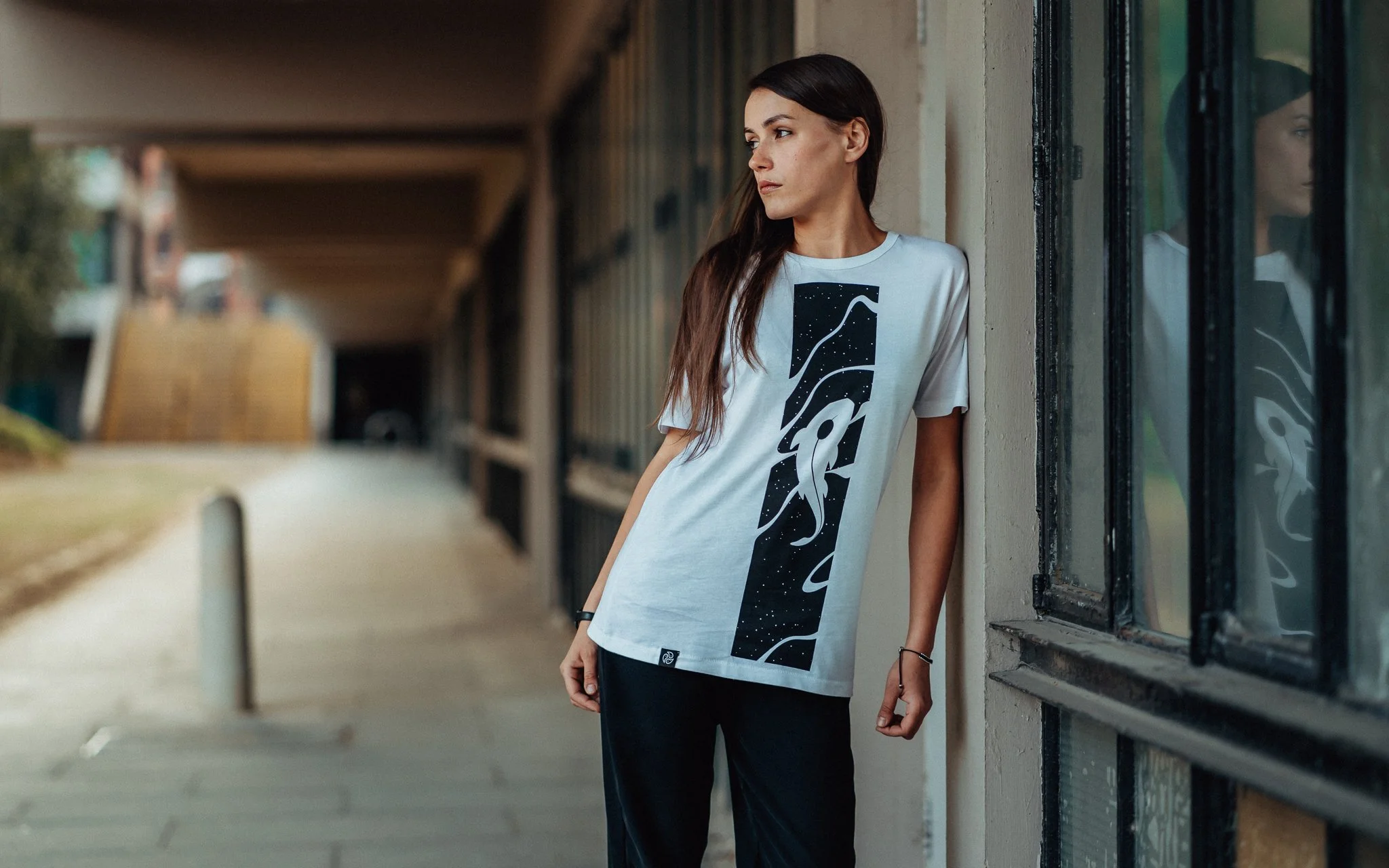 Female model poses with carp T-shirt by Tomoto