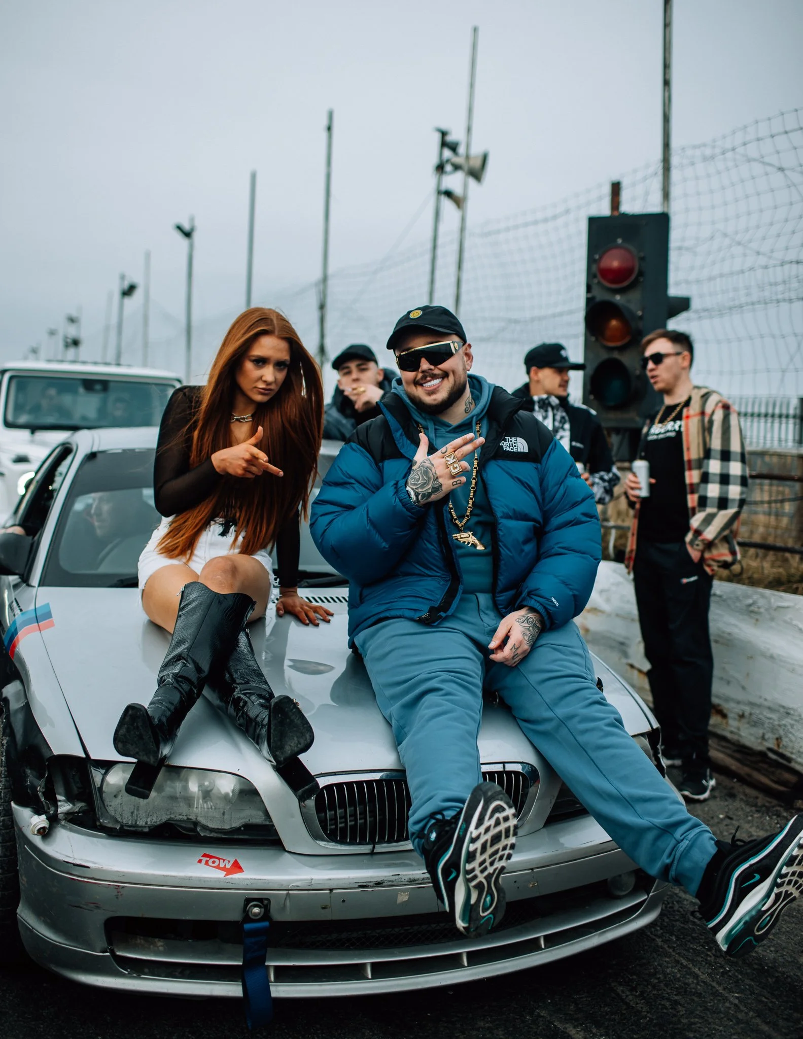  Gareth Kelly from the bad boy, Chiller Crew sits on bonnet of BMW