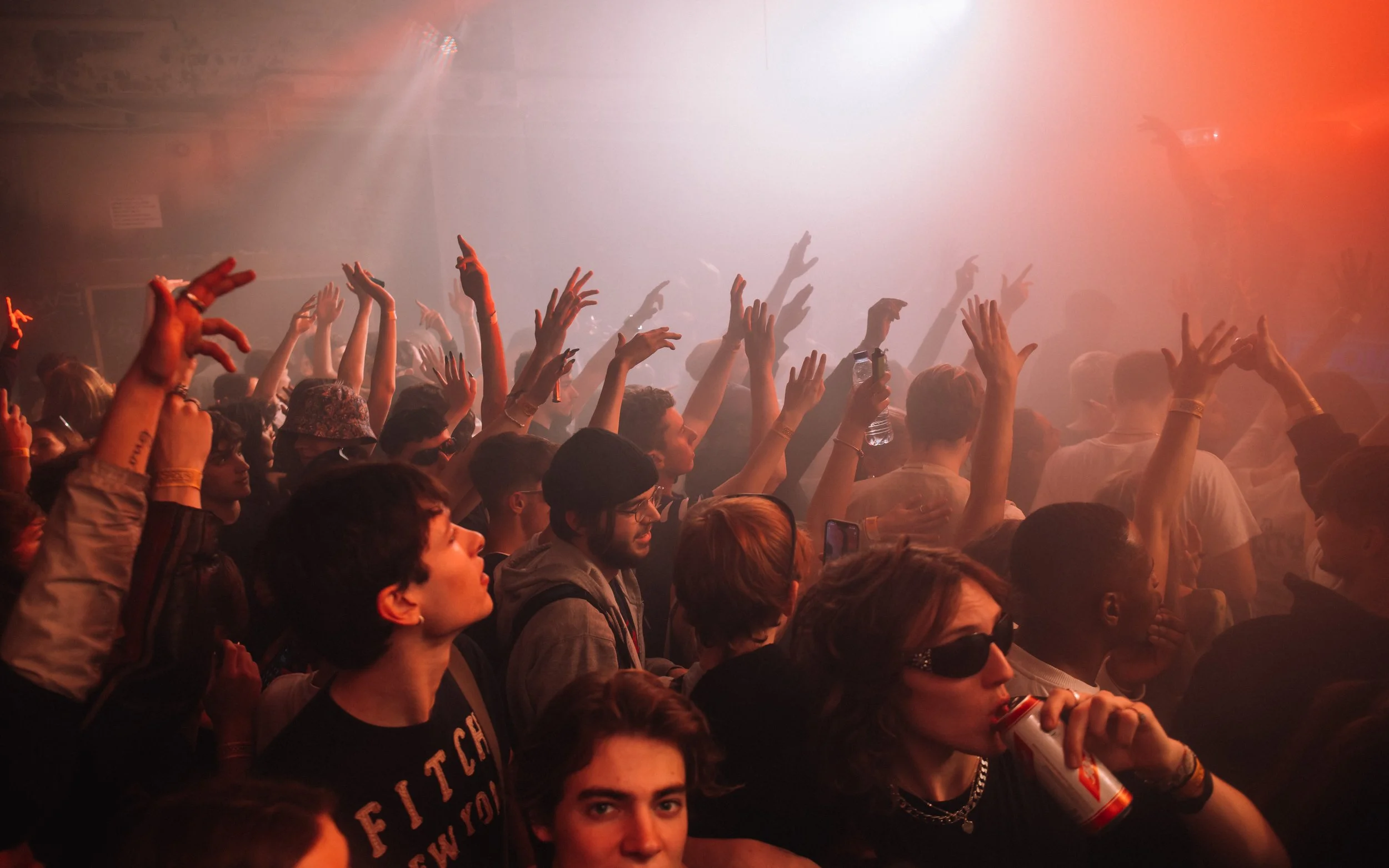 crowd with hands in the air