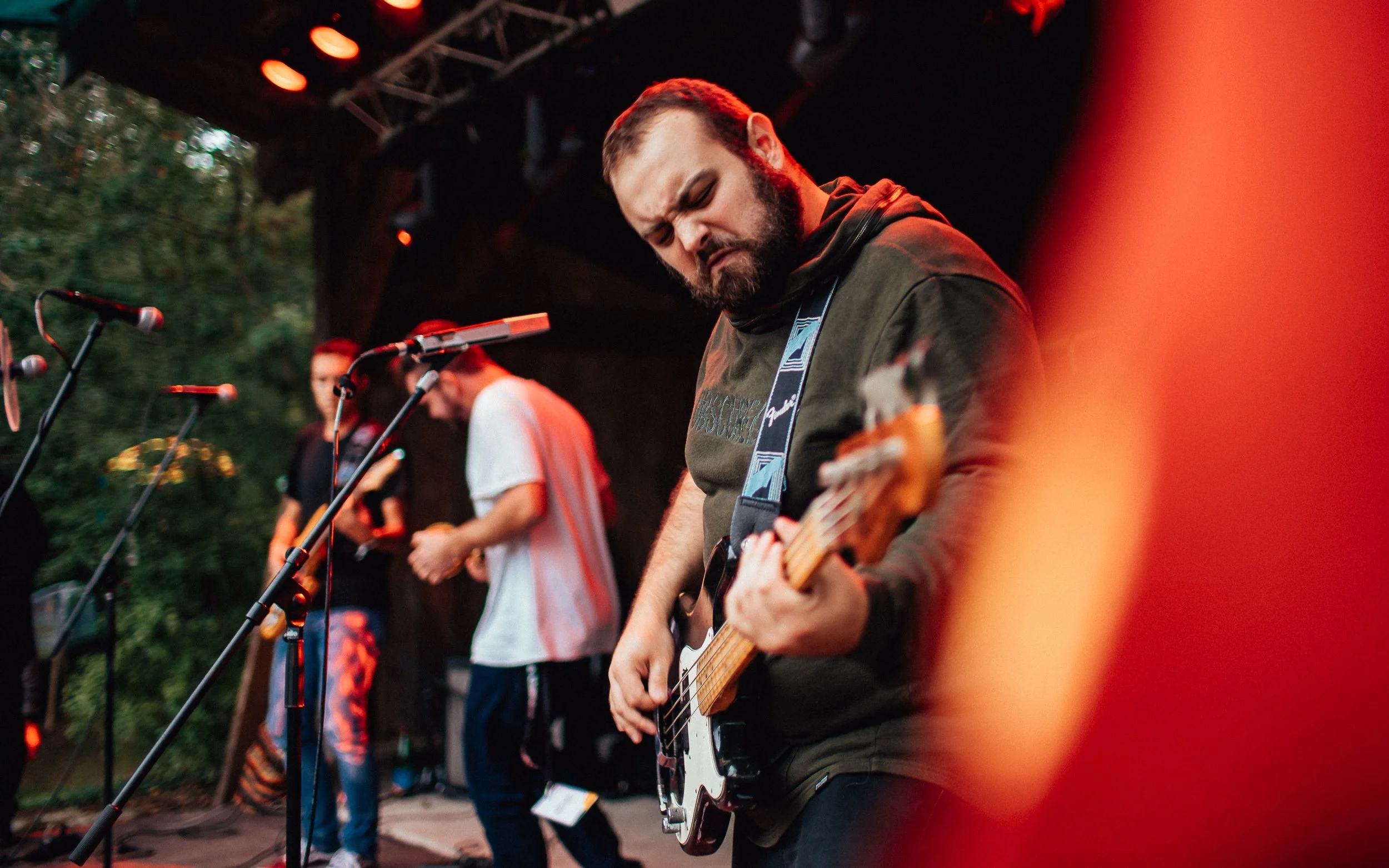  a band playing at a music festival in Italy